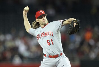 PHOENIX, AZ - APRIL 09: Starting pitcher Bronson Arroyo #61 of the Cincinnati Reds pitches against the Arizona Diamondbacks during the Major League Baseball game at Chase Field on April 9, 2011 in Phoenix, Arizona. The Reds defeated the Diamondbacks 6-1. PHOENIX, AZ - APRIL 09: Starting pitcher Bronson Arroyo #61 of the Cincinnati Reds pitches against the Arizona Diamondbacks during the Major League Baseball game at Chase Field on April 9, 2011 in Phoenix, Arizona. The Reds defeated the Diamondbacks 6-1.