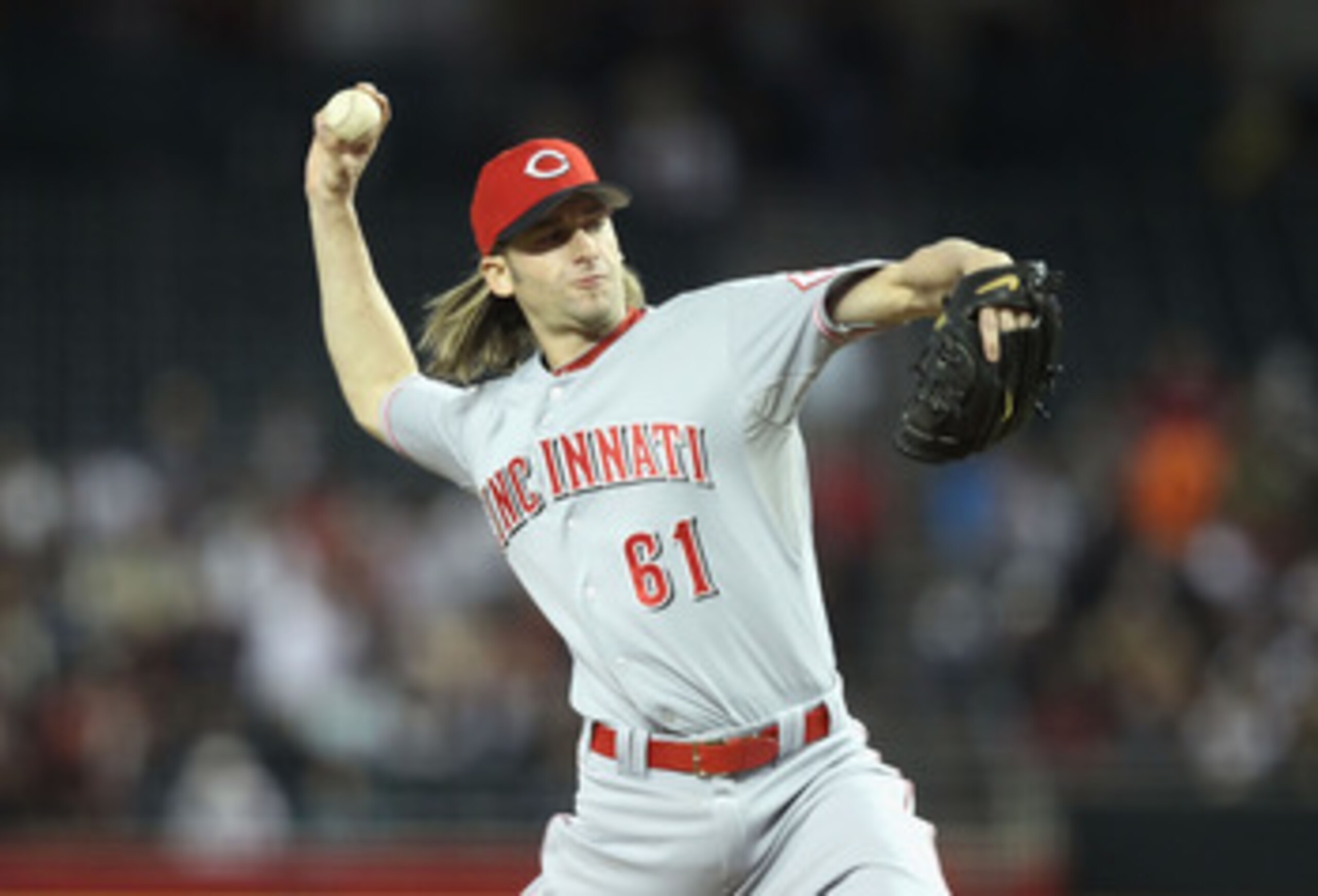 PHOENIX, AZ - APRIL 09: Starting pitcher Bronson Arroyo #61 of the Cincinnati Reds pitches against the Arizona Diamondbacks during the Major League Baseball game at Chase Field on April 9, 2011 in Phoenix, Arizona. The Reds defeated the Diamondbacks 6-1. PHOENIX, AZ - APRIL 09: Starting pitcher Bronson Arroyo #61 of the Cincinnati Reds pitches against the Arizona Diamondbacks during the Major League Baseball game at Chase Field on April 9, 2011 in Phoenix, Arizona. The Reds defeated the Diamondbacks 6-1.