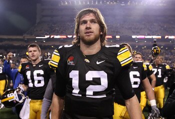 TEMPE, AZ - DECEMBER 28:  Quarterback Ricky Stanzi #12 of the Iowa Hawkeyes walks off the field after defeating the Missouri Tigers in the Insight Bowl at Sun Devil Stadium on December 28, 2010 in Tempe, Arizona. The Hawkeyes defeated the Tigers 27-24. (P