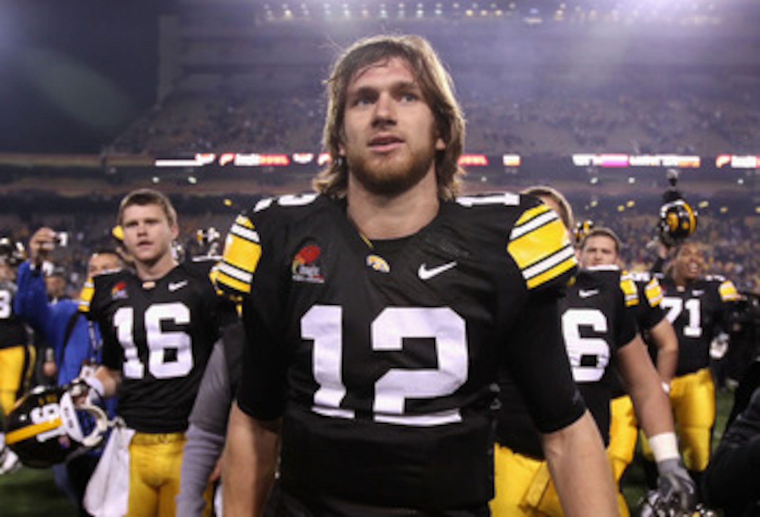 TEMPE, AZ - DECEMBER 28:  Quarterback Ricky Stanzi #12 of the Iowa Hawkeyes walks off the field after defeating the Missouri Tigers in the Insight Bowl at Sun Devil Stadium on December 28, 2010 in Tempe, Arizona. The Hawkeyes defeated the Tigers 27-24. (P