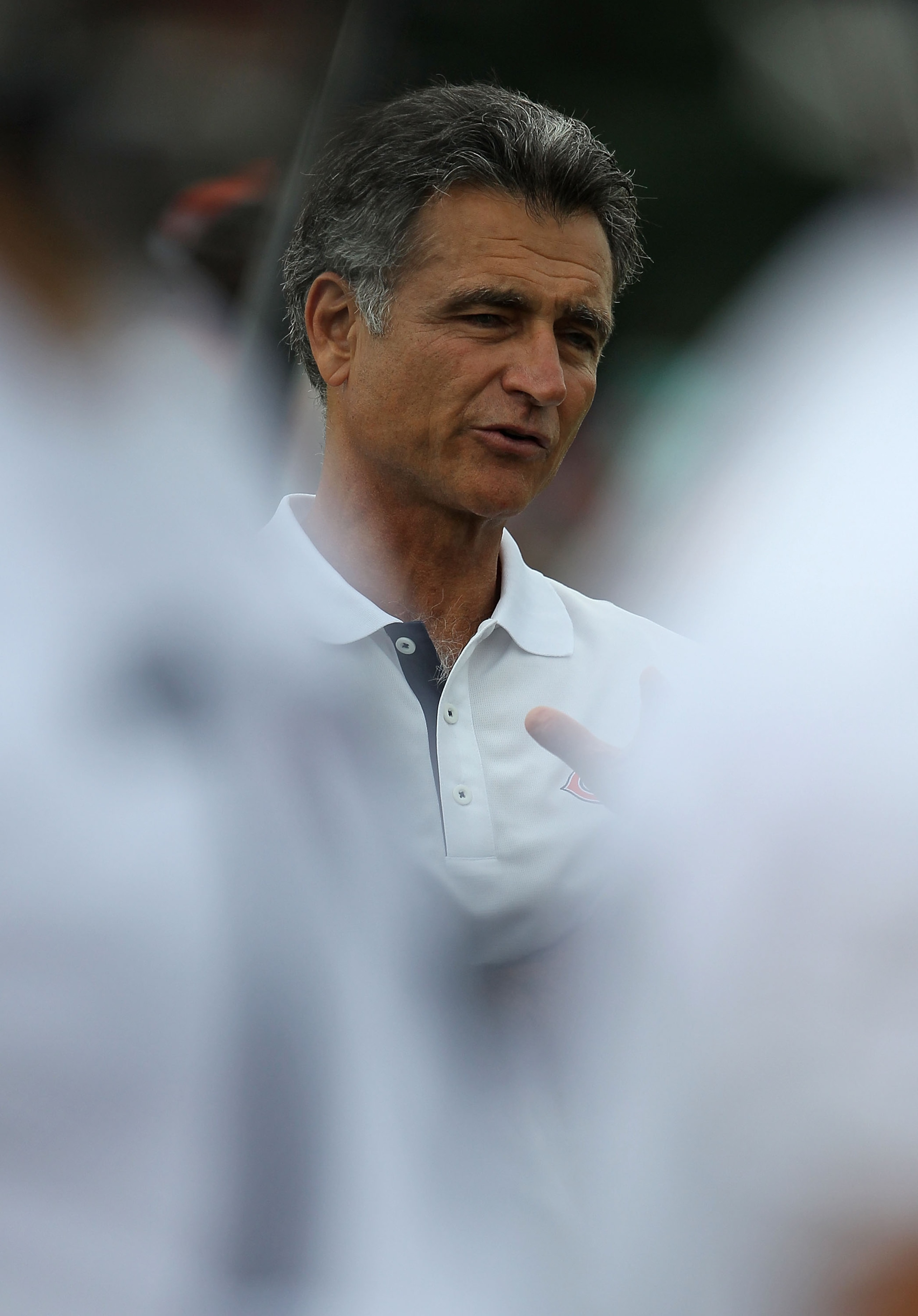 BOURBONNAIS, IL - JULY 30: General manager Jerry Angelo of the Chicago Bears watches a summer training camp practice at Olivet Nazarene University on July 30, 2010 in Bourbonnais, Illinois. (Photo by Jonathan Daniel/Getty Images)