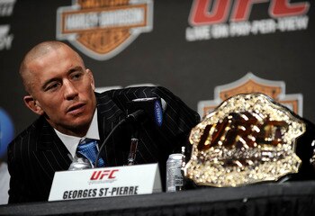NEW YORK - MARCH 24: Georges St-Pierre of Montreal, Quebec, Canada speaks at a press conference for UFC 111 at Radio City Music Hall on March 24, 2010 in New York City. St-Pierre will face Dan Hardy of Nottingham UK in the Welterweight title bout. (Pho NEW YORK - MARCH 24: Georges St-Pierre of Montreal, Quebec, Canada speaks at a press conference for UFC 111 at Radio City Music Hall on March 24, 2010 in New York City. St-Pierre will face Dan Hardy of Nottingham UK in the Welterweight title bout. (Pho