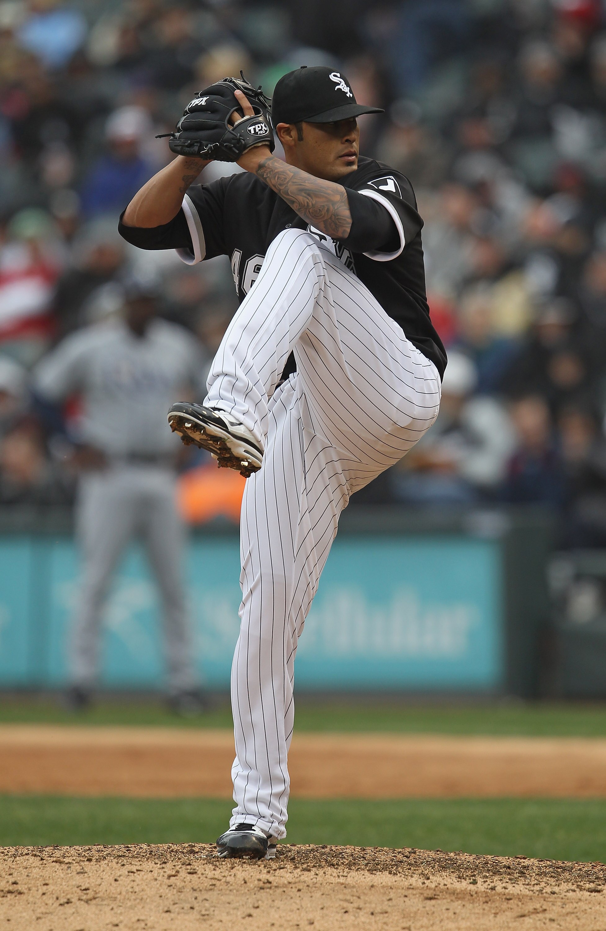 CHICAGO, IL - APRIL 07: Sergio Santos #46 of the Chicago White Sox pitches in the 9th inning against the Tampa Bay Rays during the home opener at U.S. Cellular Field on April 7, 2011 in Chicago, Illinois. The White Sox defeated the Rays 5-1. (Photo by Jon