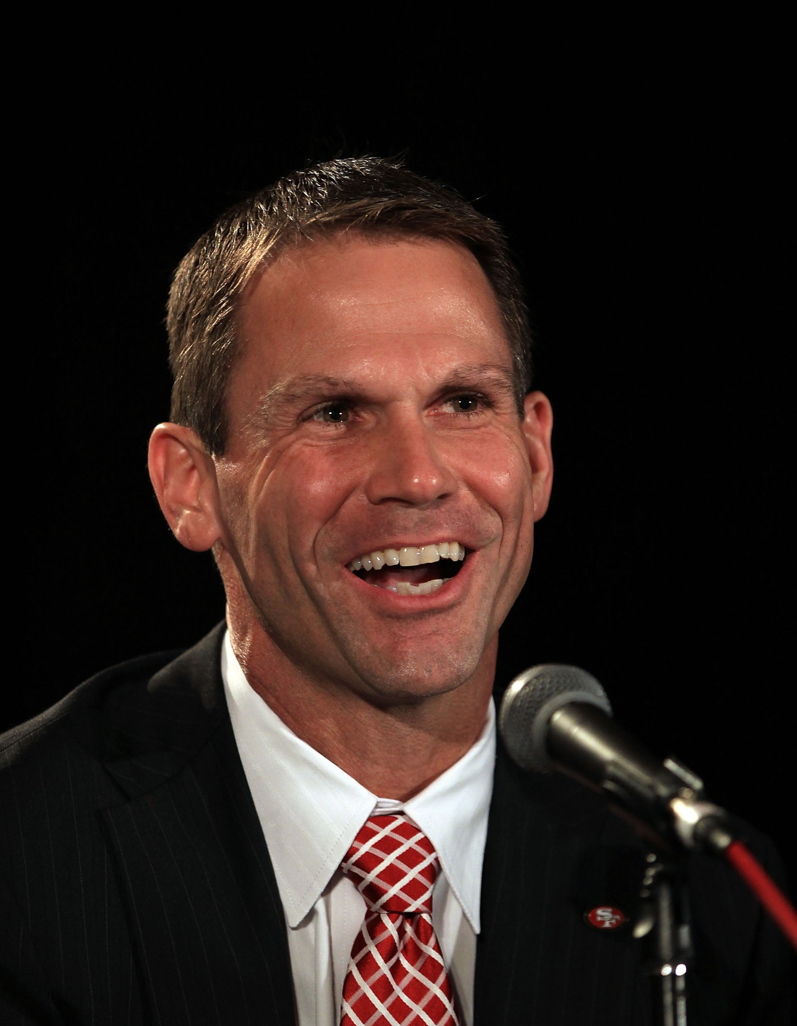 SAN FRANCISCO, CA - JANUARY 07:  General manager Trent Baalke speaks at a press conference where Jim Harbaugh was introduced as the new San Francisco 49ers head coach at the Palace Hotel on January 7, 2011 in San Francisco, California.  (Photo by Ezra Sha