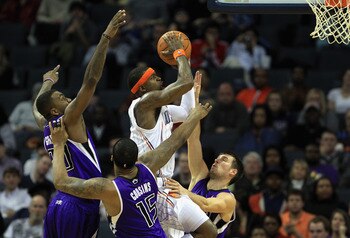 CHARLOTTE, NC - FEBRUARY 25:  Stephen Jackson #1 of the Charlotte Bobcats drives to the basket against teammates Donte Greene #20 DeMarcus Cousins #15 and Beno Udrih #19 of the Sacramento Kings during their game at Time Warner Cable Arena on February 25, 