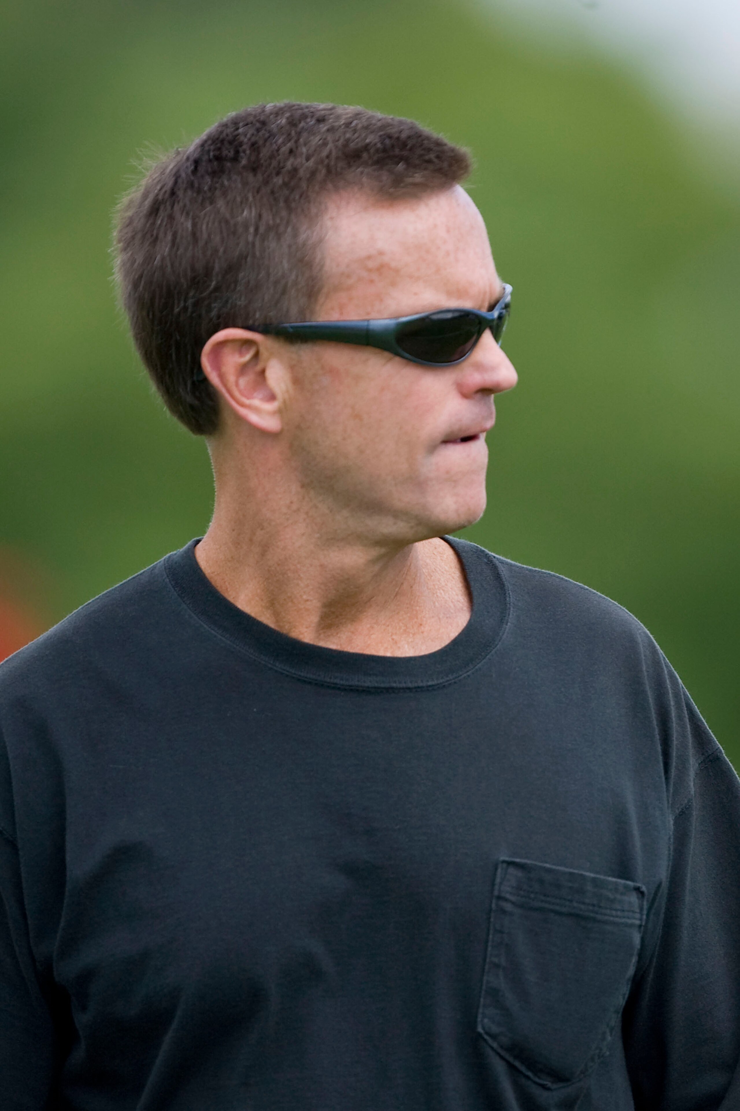 ST. LOUIS - JULY 31:  General manager Billy Devaney of the St. Louis Rams looks on during training camp at the Russell Athletic Training Facility on July 31, 2009 in St. Louis, Missouri.  (Photo by Dilip Vishwanat/Getty Images)