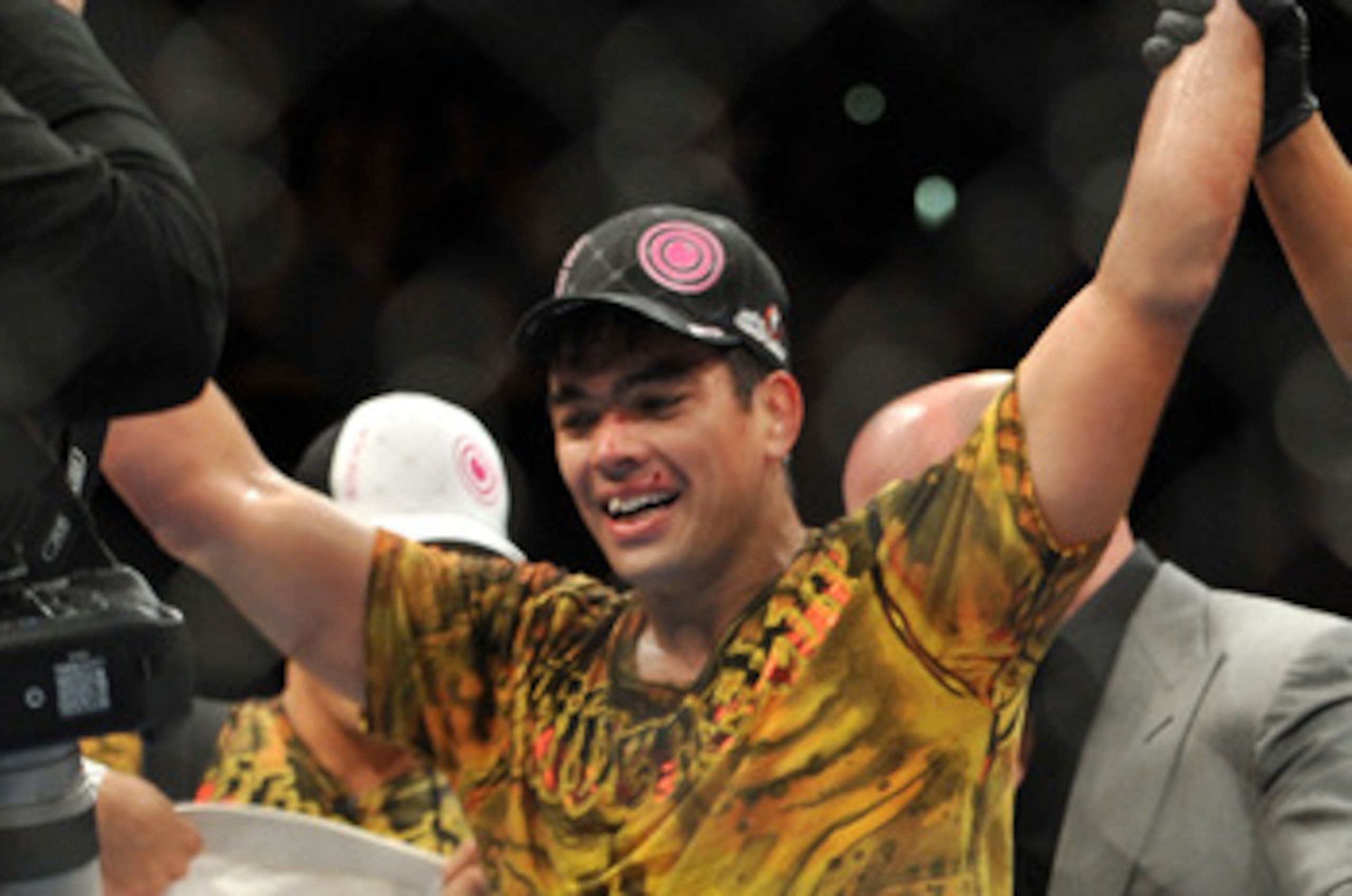 LOS ANGELES, CA - OCTOBER 24:  UFC Light Heavyweight Champion Lyoto Machida celebrates his victory over UFC Light Heavyweight challenger Mauricio Rua (not pictured) in their title fight at UFC 104 at Staples Center on October 24, 2009 in Los Angeles, Cali