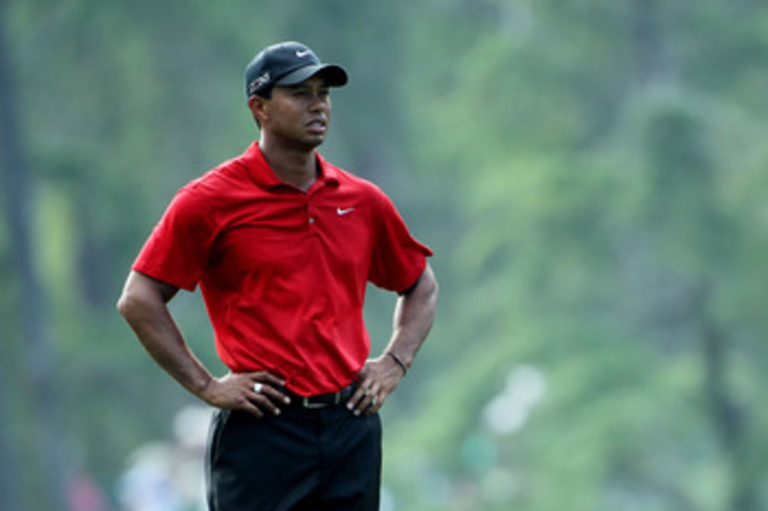 AUGUSTA, GA - APRIL 10:  Tiger Woods looks on during the final round of the 2011 Masters Tournament at Augusta National Golf Club on April 10, 2011 in Augusta, Georgia.  (Photo by Jamie Squire/Getty Images)