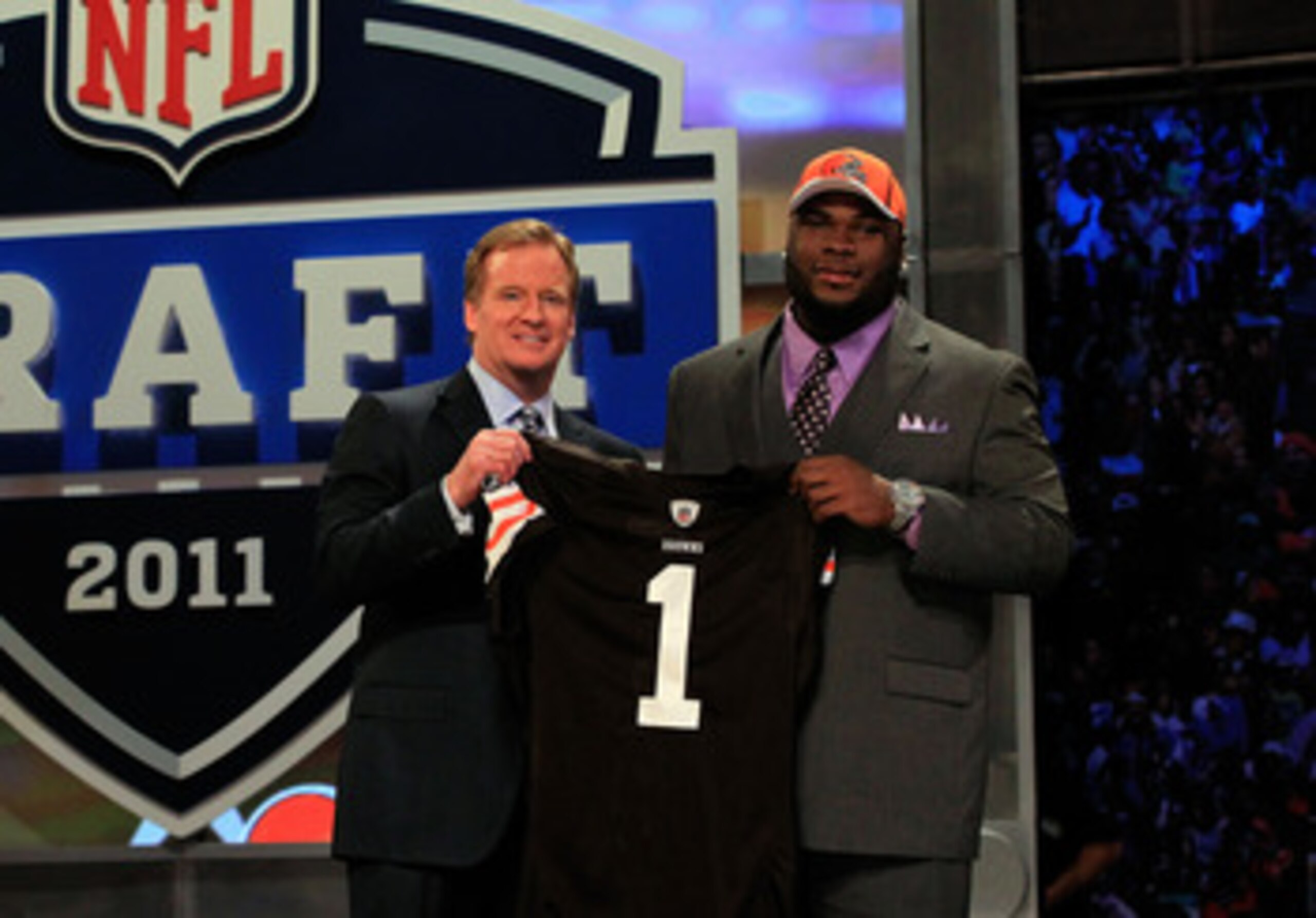 NEW YORK, NY - APRIL 28:  NFL Commissioner ROger Goodell (L) poses for a photo with Phil Taylor, #21 overall pick by the Cleveland Browns, on stage during the 2011 NFL Draft at Radio City Music Hall on April 28, 2011 in New York City.  (Photo by Chris Tro