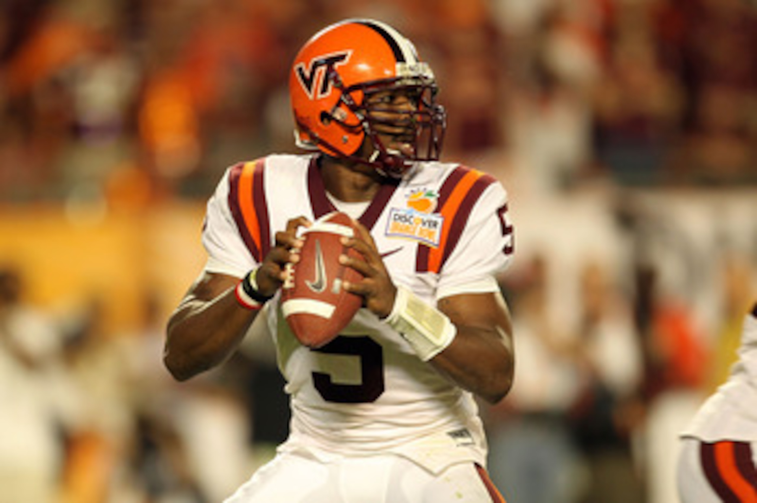 MIAMI, FL - JANUARY 03:  Tyrod Taylor #5 of the Virginai Tech Hokies drops back to pass against the Stanford Cardinal during the 2011 Discover Orange Bowl at Sun Life Stadium on January 3, 2011 in Miami, Florida.  (Photo by Mike Ehrmann/Getty Images)