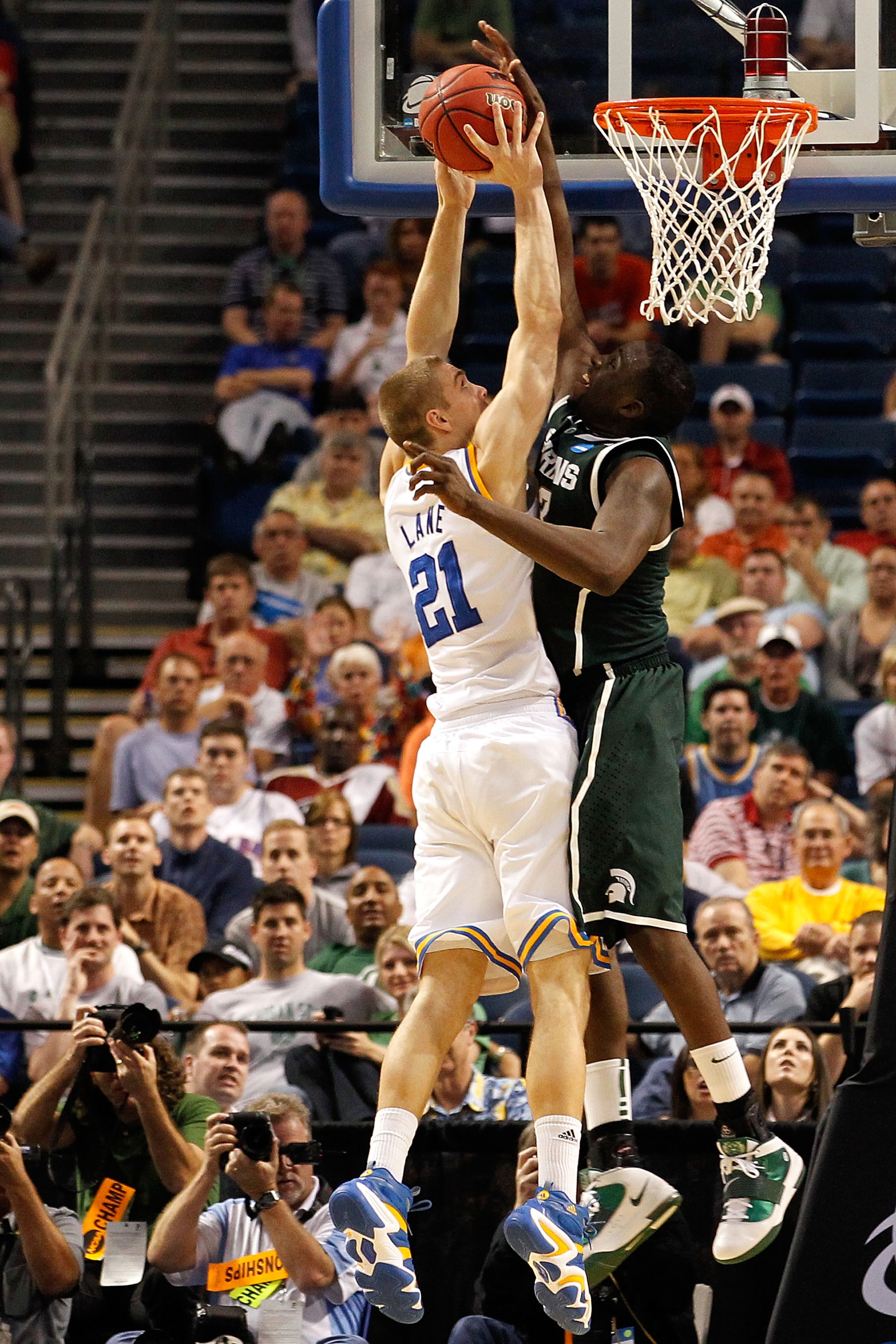 TAMPA, FL - MARCH 17:  Draymond Green #23 of the Michigan State Spartans blocks a shot attempt by Brendan Lane #21 of the UCLA Bruins in the second half during the second round of the 2011 NCAA men's basketball tournament at St. Pete Times Forum on March