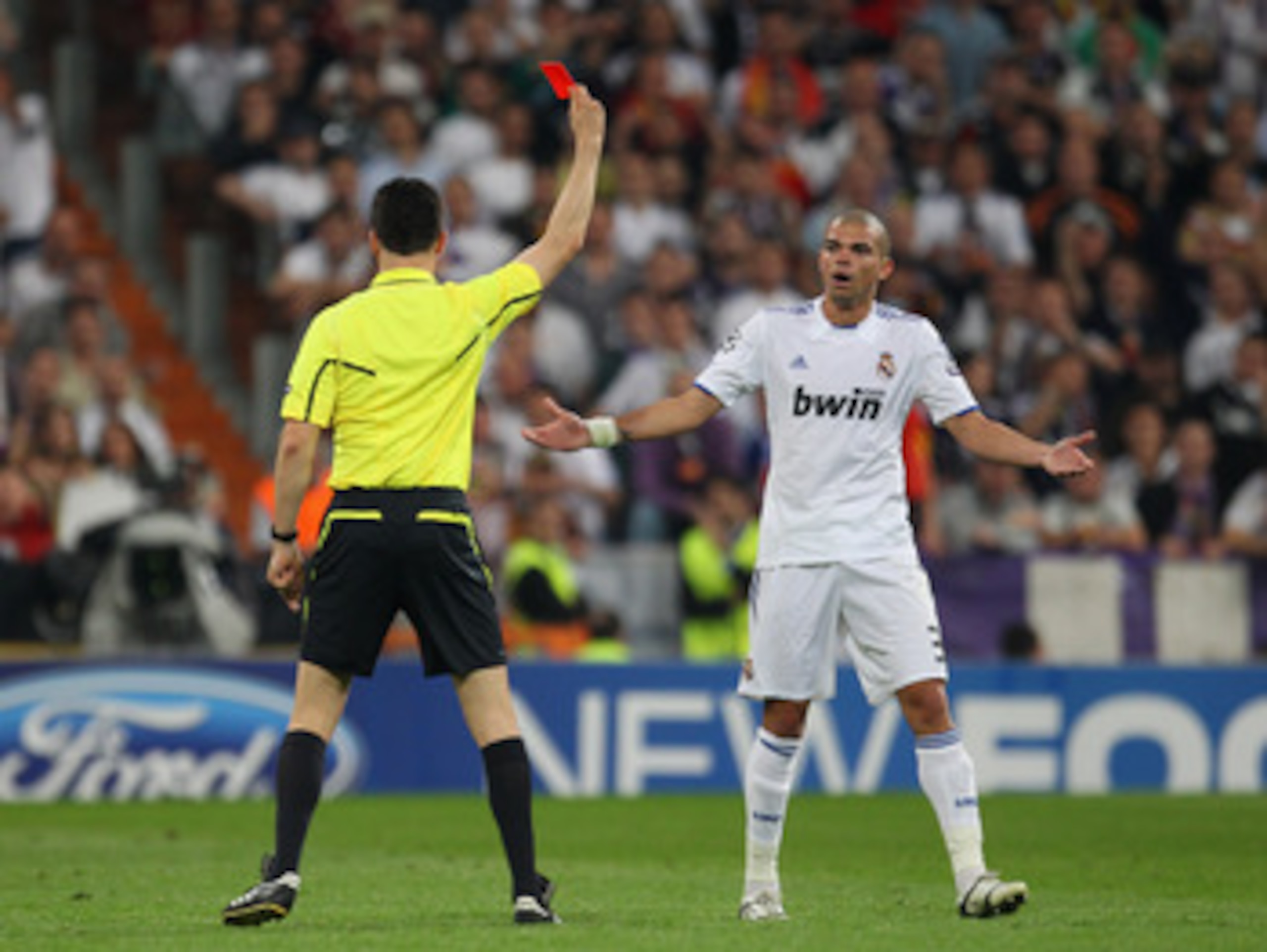 MADRID, SPAIN - APRIL 27: Pepe of Real Madrid is sent off by Wolfgang Stark during the UEFA Champions League Semi Final first leg match between Real Madrid and Barcelona at Estadio Santiago Bernabeu on April 27, 2011 in Madrid, Spain. (Photo by Alex Liv MADRID, SPAIN - APRIL 27: Pepe of Real Madrid is sent off by Wolfgang Stark during the UEFA Champions League Semi Final first leg match between Real Madrid and Barcelona at Estadio Santiago Bernabeu on April 27, 2011 in Madrid, Spain. (Photo by Alex Liv