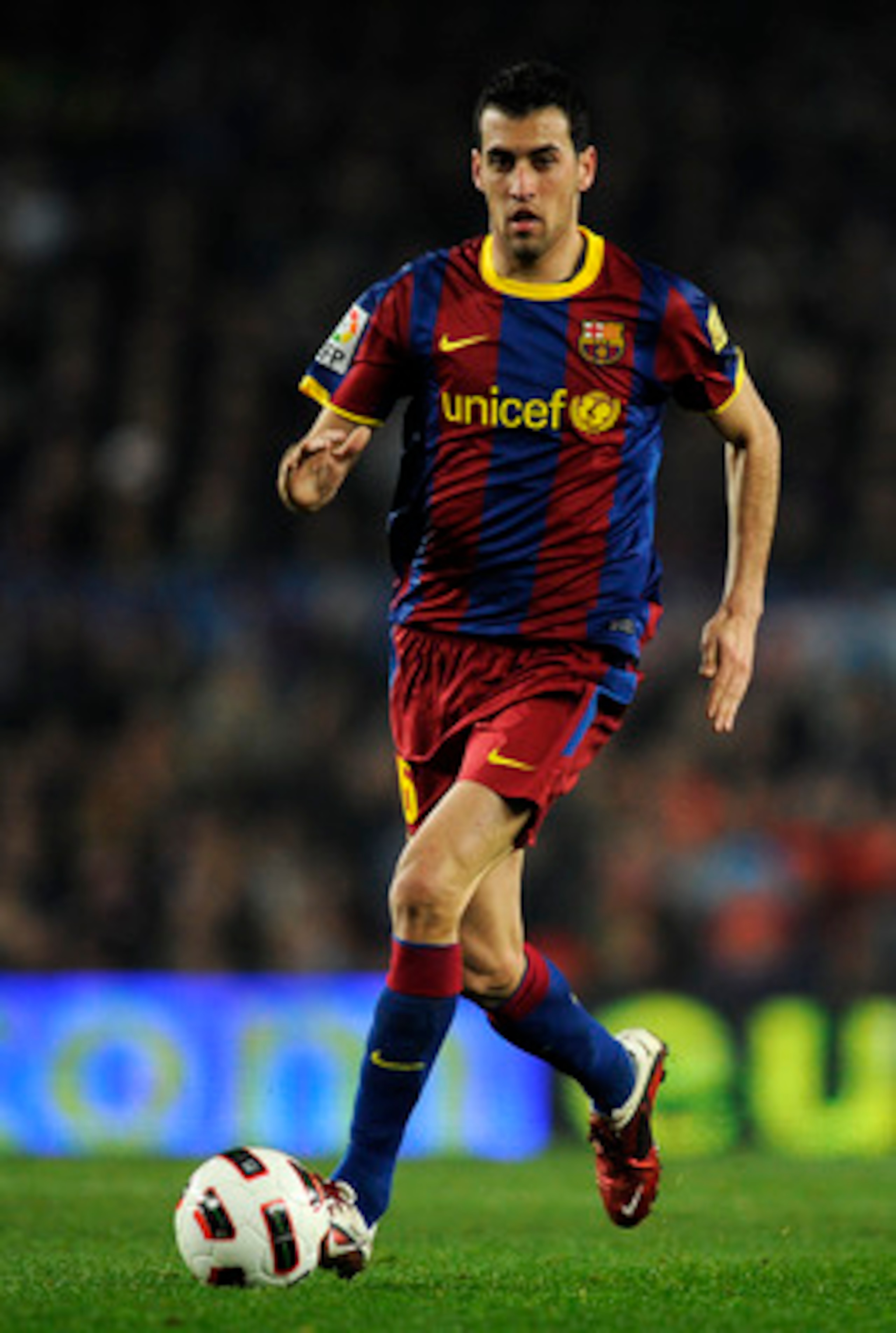 BARCELONA, SPAIN - FEBRUARY 05: Sergio Busquets of Barcelona runs with the ball during the La Liga match between Barcelona and Atletico de Madrid at Camp Nou on February 5, 2011 in Barcelona, Spain. Barcelona won 3-0. (Photo by David Ramos/Getty Images) BARCELONA, SPAIN - FEBRUARY 05: Sergio Busquets of Barcelona runs with the ball during the La Liga match between Barcelona and Atletico de Madrid at Camp Nou on February 5, 2011 in Barcelona, Spain. Barcelona won 3-0. (Photo by David Ramos/Getty Images)