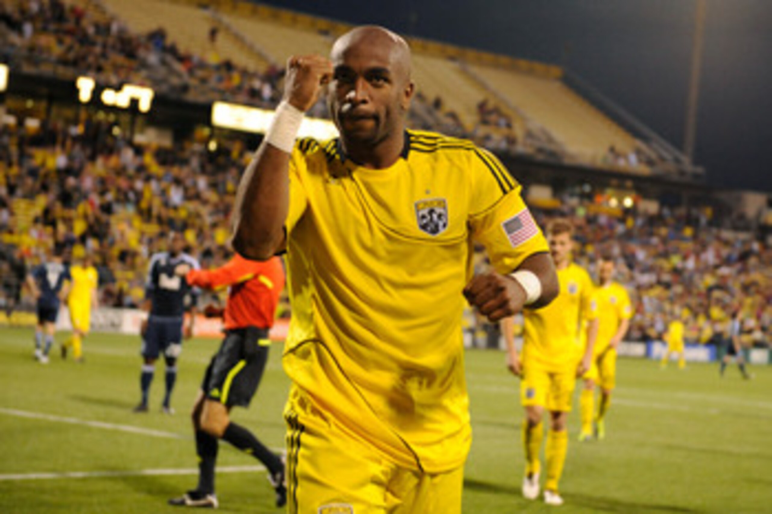 COLUMBUS, OH - APRIL 30:  Emilio Renteria #20 of the Columbus Crew pumps his fist after he is awarded a penalty shot in the second half against the Vancouver Whitecaps FC on April 30, 2011 at Crew Stadium in Columbus, Ohio. Columbus defeated Vancouver 2-1