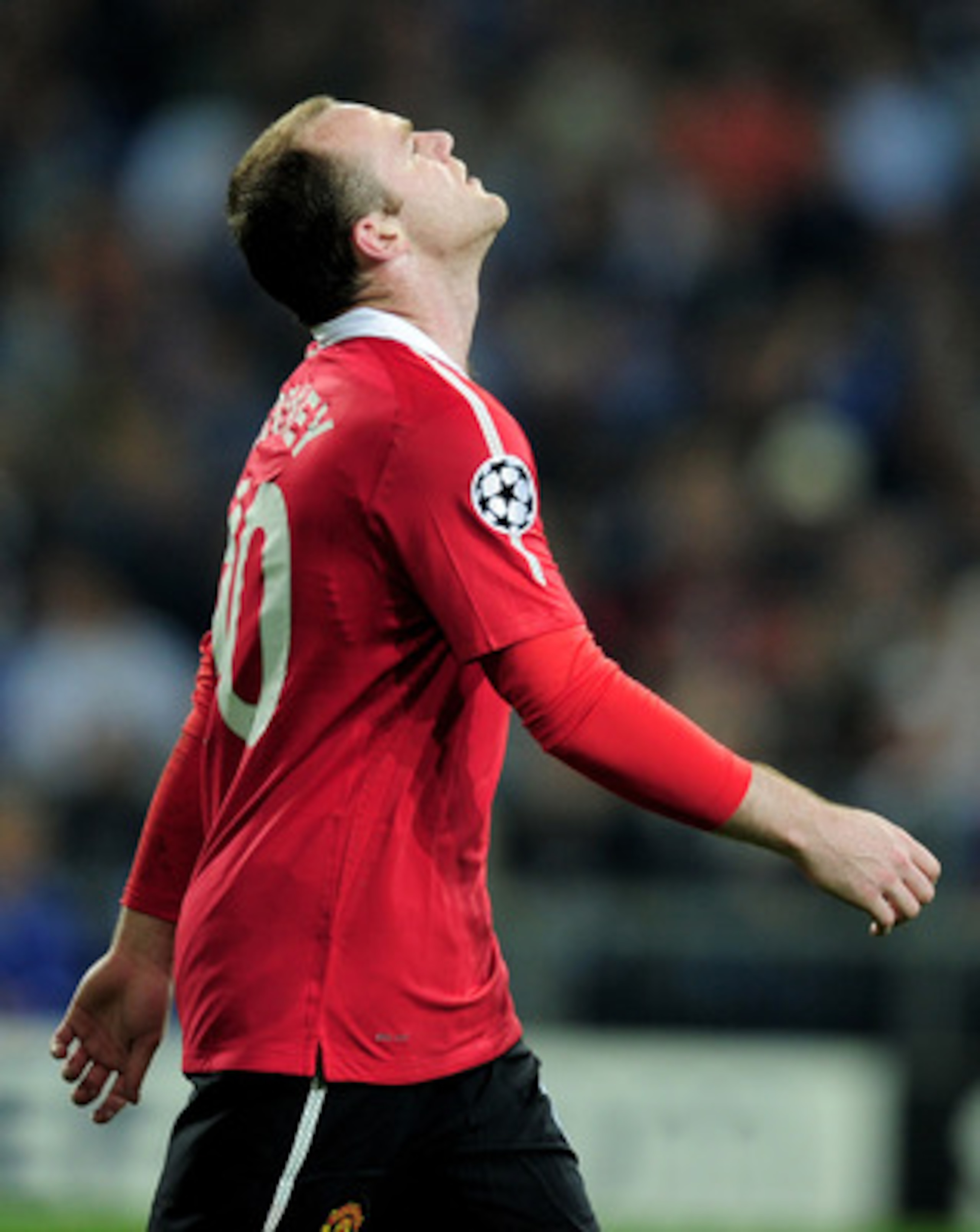 GELSENKIRCHEN, GERMANY - APRIL 26: Wayne Rooney of Manchester United reacts during the UEFA Champions League Semi Final first leg match between FC Schalke 04 and Manchester United at Veltins Arena on April 26, 2011 in Gelsenkirchen, Germany. (Photo by J GELSENKIRCHEN, GERMANY - APRIL 26: Wayne Rooney of Manchester United reacts during the UEFA Champions League Semi Final first leg match between FC Schalke 04 and Manchester United at Veltins Arena on April 26, 2011 in Gelsenkirchen, Germany. (Photo by J