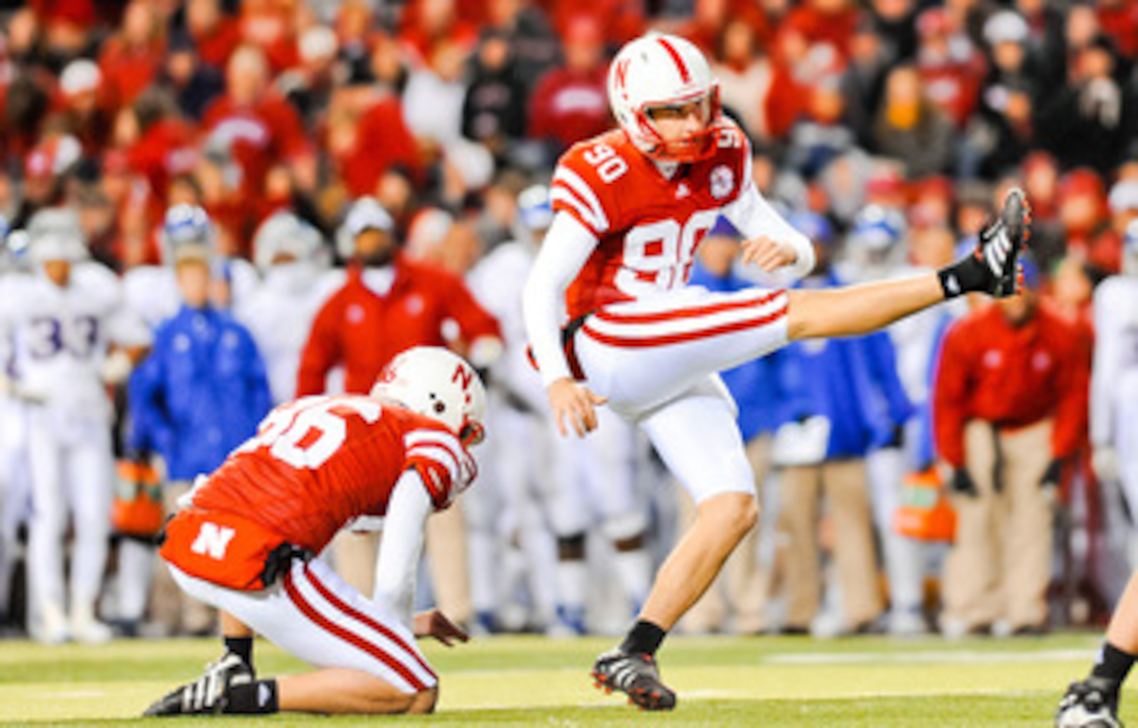LINCOLN, NE - NOVEMBER 13: Alex Henery #90 of the Nebraska Cornhuskers kicks an extra point against the Kansas Jayhawks during their game at Memorial Stadium on November 13, 2010 in Lincoln, Nebraska. Nebraska Defeated Kansas 20-3. (Photo by Eric Francis/