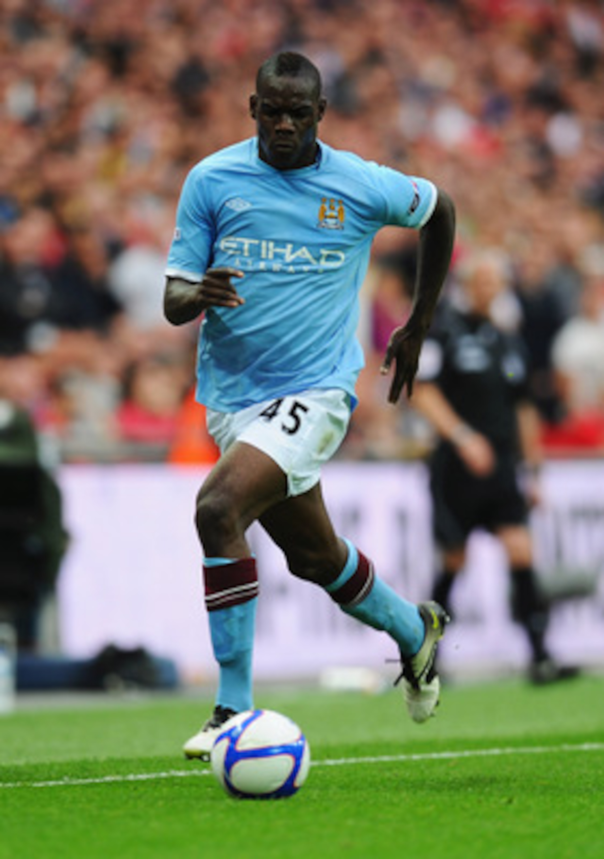 LONDON, ENGLAND - APRIL 16: Mario Balotelli of Manchester City in action during the FA Cup sponsored by E.ON semi final match between Manchester City and Manchester United at Wembley Stadium on April 16, 2011 in London, England. (Photo by Mike Hewitt/Ge LONDON, ENGLAND - APRIL 16: Mario Balotelli of Manchester City in action during the FA Cup sponsored by E.ON semi final match between Manchester City and Manchester United at Wembley Stadium on April 16, 2011 in London, England. (Photo by Mike Hewitt/Ge