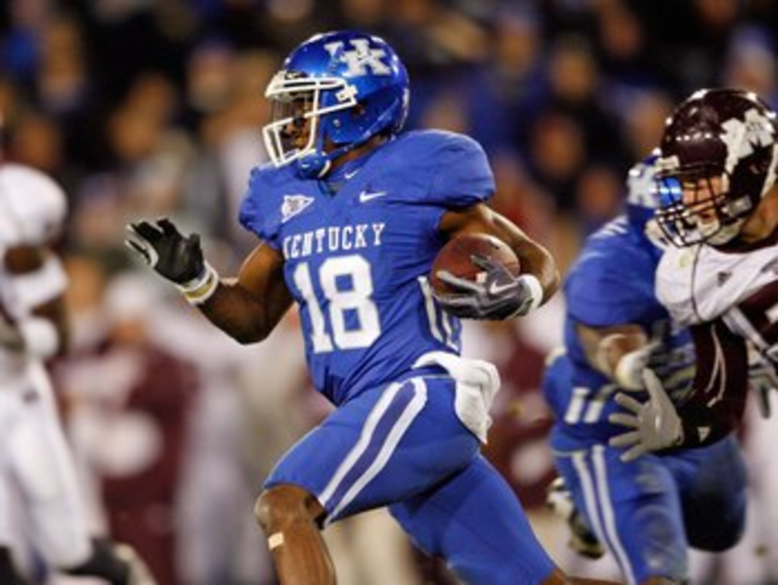 LEXINGTON, KY - OCTOBER 31:  Randall Cobb #18 of the Kentucky Wildcats runs with the ball during the SEC game against the Mississippi State Bulldogs at Commonwealth Stadium on October 31, 2009 in Lexington, Kentucky.  Mississippi State won 31-24.  (Photo