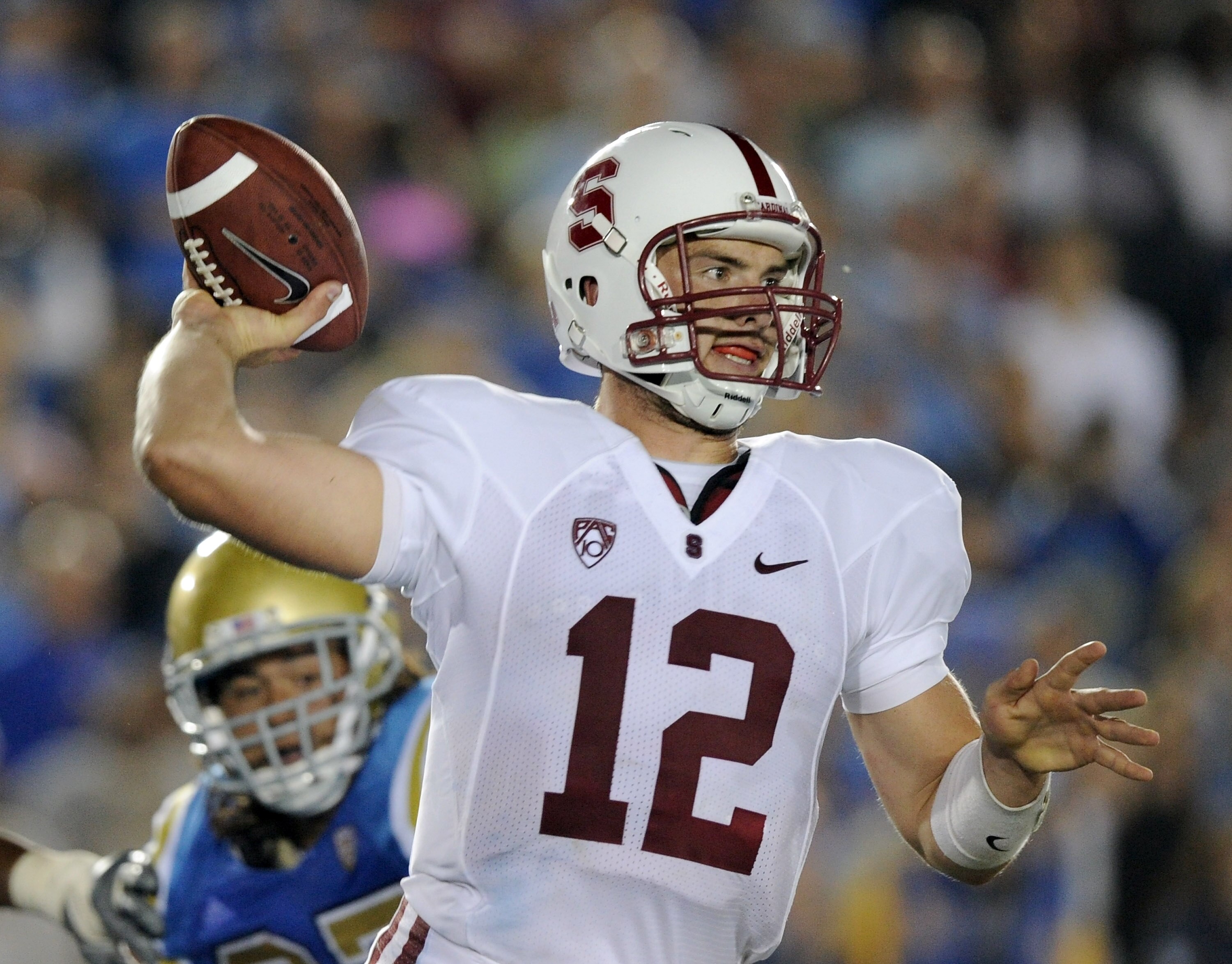 PASADENA, CA - SEPTEMBER 11:  Andrew Luck #12 of Stanford passes in the pocket against UCLA during the first quarter at Rose Bowl on September 11, 2010 in Pasadena, California.  (Photo by Harry How/Getty Images)