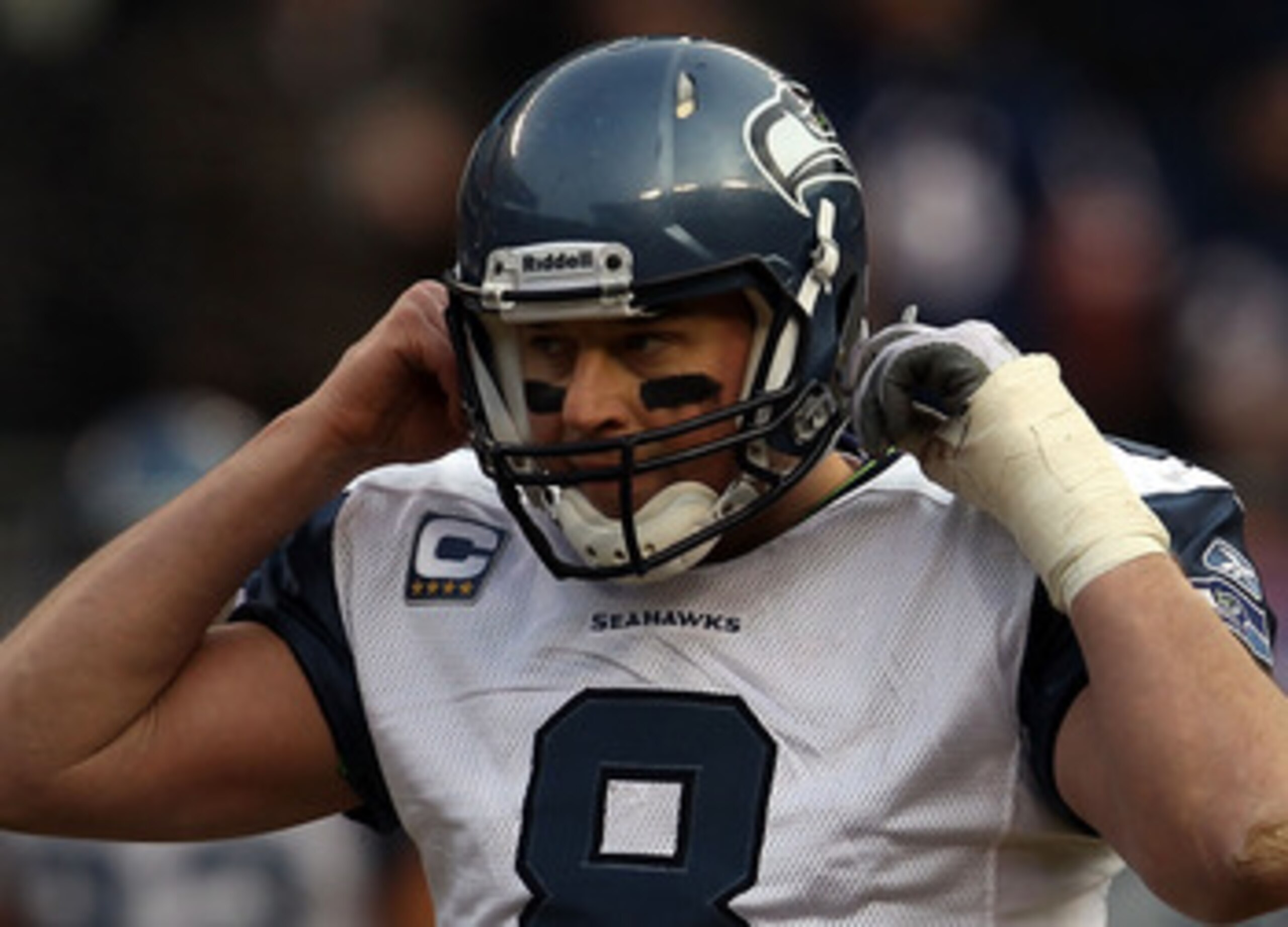 CHICAGO, IL - JANUARY 16:  Quarterback Matt Hasselbeck #8 of the Seattle Seahawks reacts while taking on the Chicago Bears in the 2011 NFC divisional playoff game at Soldier Field on January 16, 2011 in Chicago, Illinois.  (Photo by Jonathan Daniel/Getty