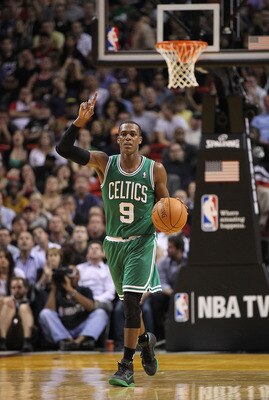 MIAMI - NOVEMBER 11:  Rajon Rondo #9 of the Boston Celtics brings the ball up the court during a game against the Miami Heat at American Airlines Arena on November 11, 2010 in Miami, Florida. NOTE TO USER: User expressly acknowledges and agrees that, by d