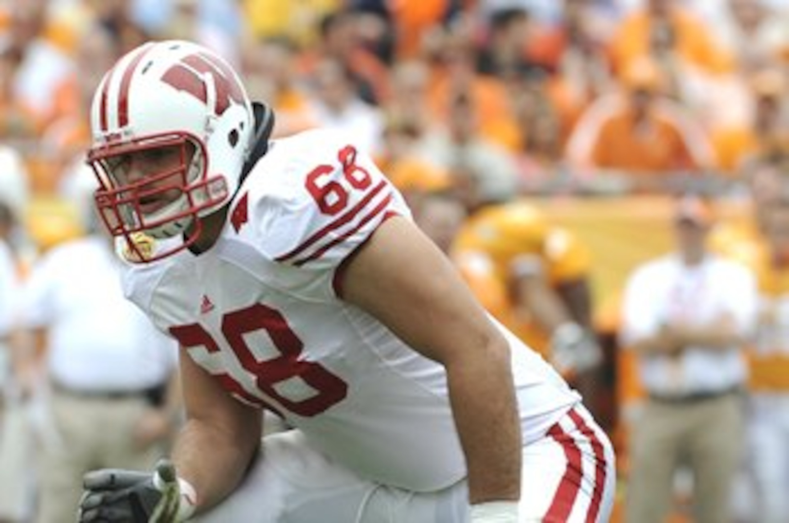TAMPA, FL -  JANUARY 1: Lineman Gabe Carimi #68 of the Wisconsin Badgers sets to block  against the Tennessee Volunteers in the 2008 Outback Bowl at Raymond James Stadium on January 1, 2008 in Tampa, Florida.  The Volunteers won 21 - 17. (Photo by Al Mess