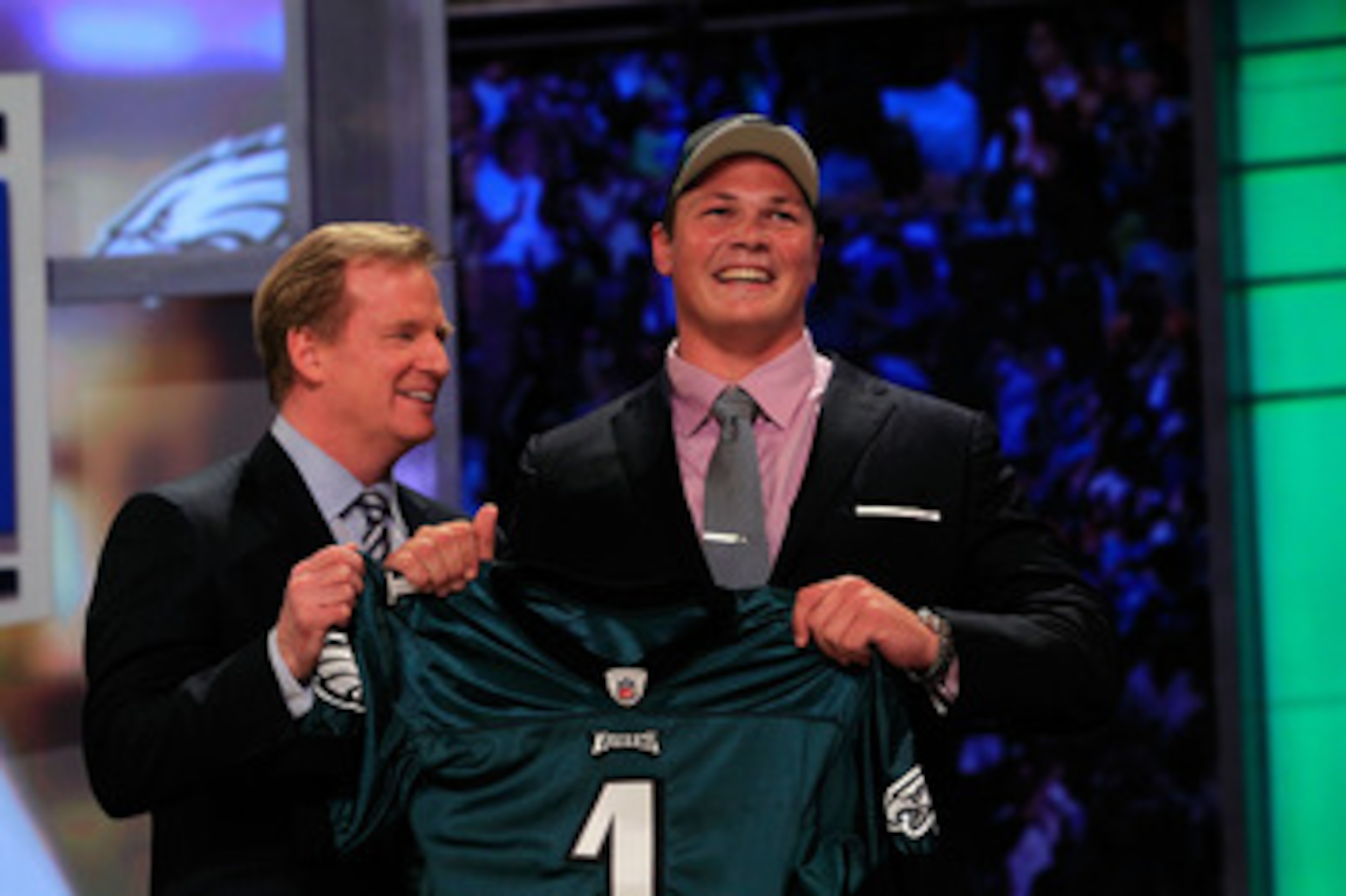NEW YORK, NY - APRIL 28: NFL Commissioner Roger Goodell (L) poses for a photo with Danny Watkins, #22 overall pick by the Philadelphia Eagles, on stage during the 2011 NFL Draft at Radio City Music Hall on April 28, 2011 in New York City. (Photo by Chri NEW YORK, NY - APRIL 28: NFL Commissioner Roger Goodell (L) poses for a photo with Danny Watkins, #22 overall pick by the Philadelphia Eagles, on stage during the 2011 NFL Draft at Radio City Music Hall on April 28, 2011 in New York City. (Photo by Chri