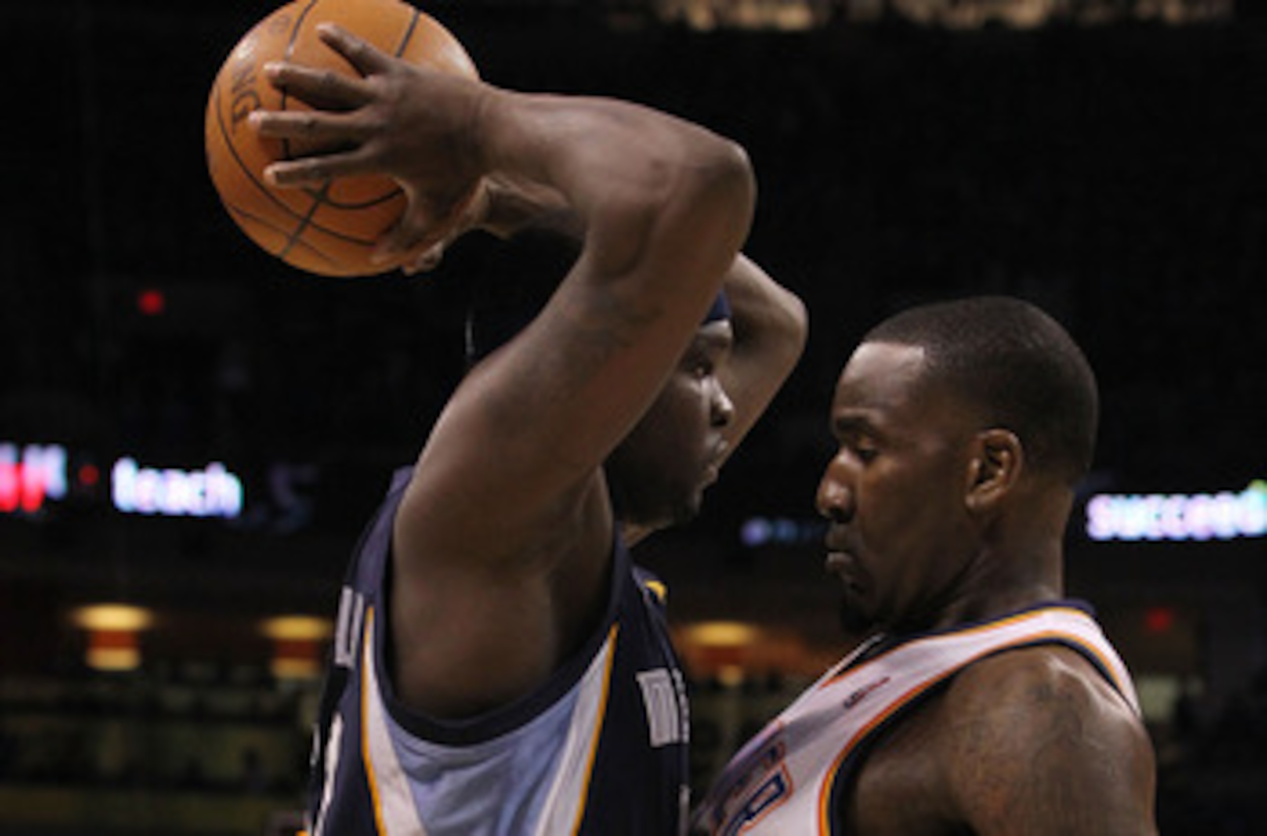 OKLAHOMA CITY, OK - MAY 01:  (L-R) Zach Randolph #50 of the Memphis Grizzlies is fouled by Kendrick Perkins #5 of the Oklahoma City Thunder in Game One of the Western Conference Semifinals in the 2011 NBA Playoffs on May 1, 2011 at Oklahoma City Arena in