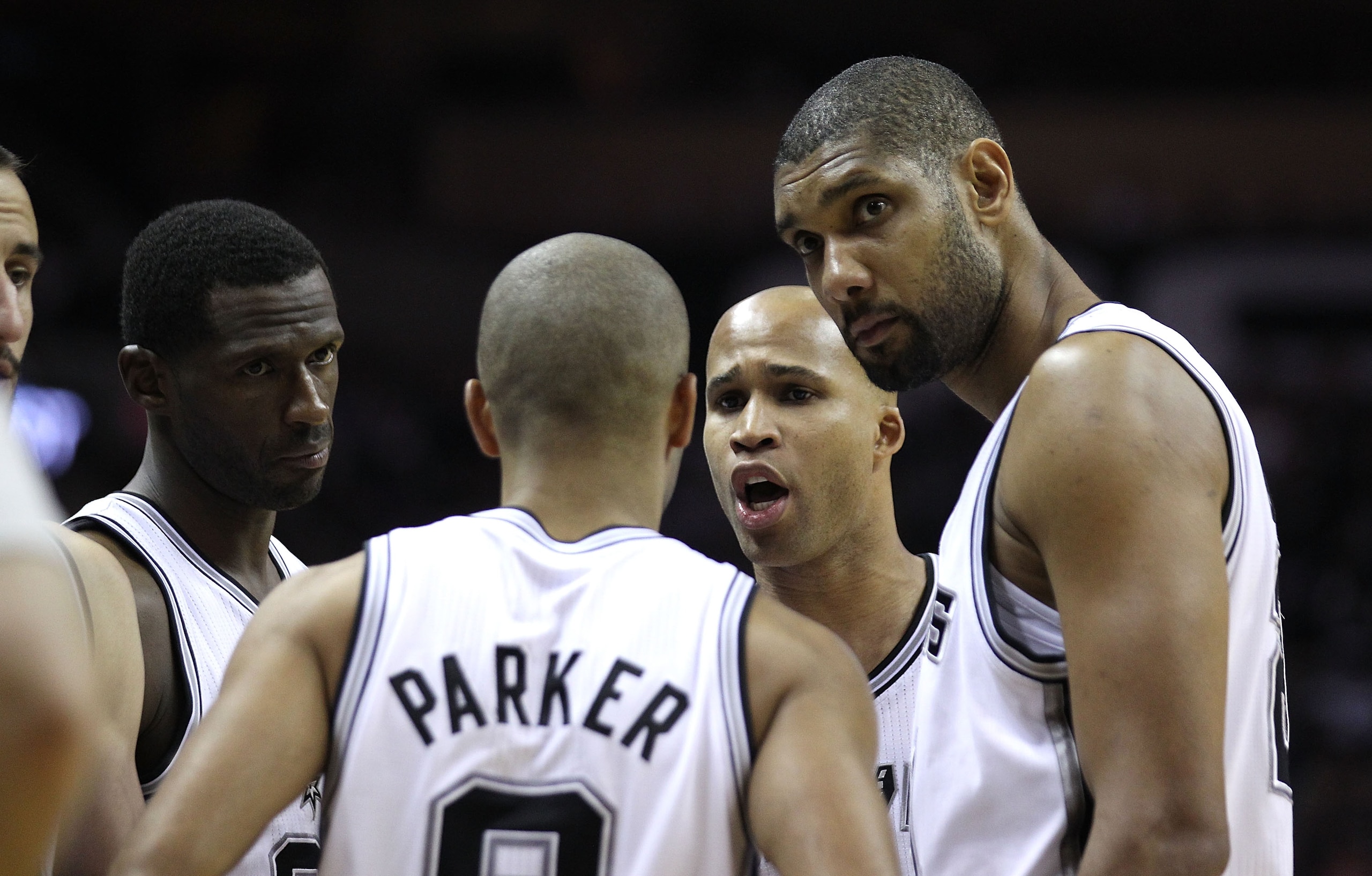 SAN ANTONIO, TX - APRIL 27:  Tim Duncan #21 of the San Antionio Spurs looks on with his teammates against the Memphis Grizzlies in Game Five of the Western Conference Quarterfinals in the 2011 NBA Playoffs on April 27, 2011 at AT&T Center in San Antonio,