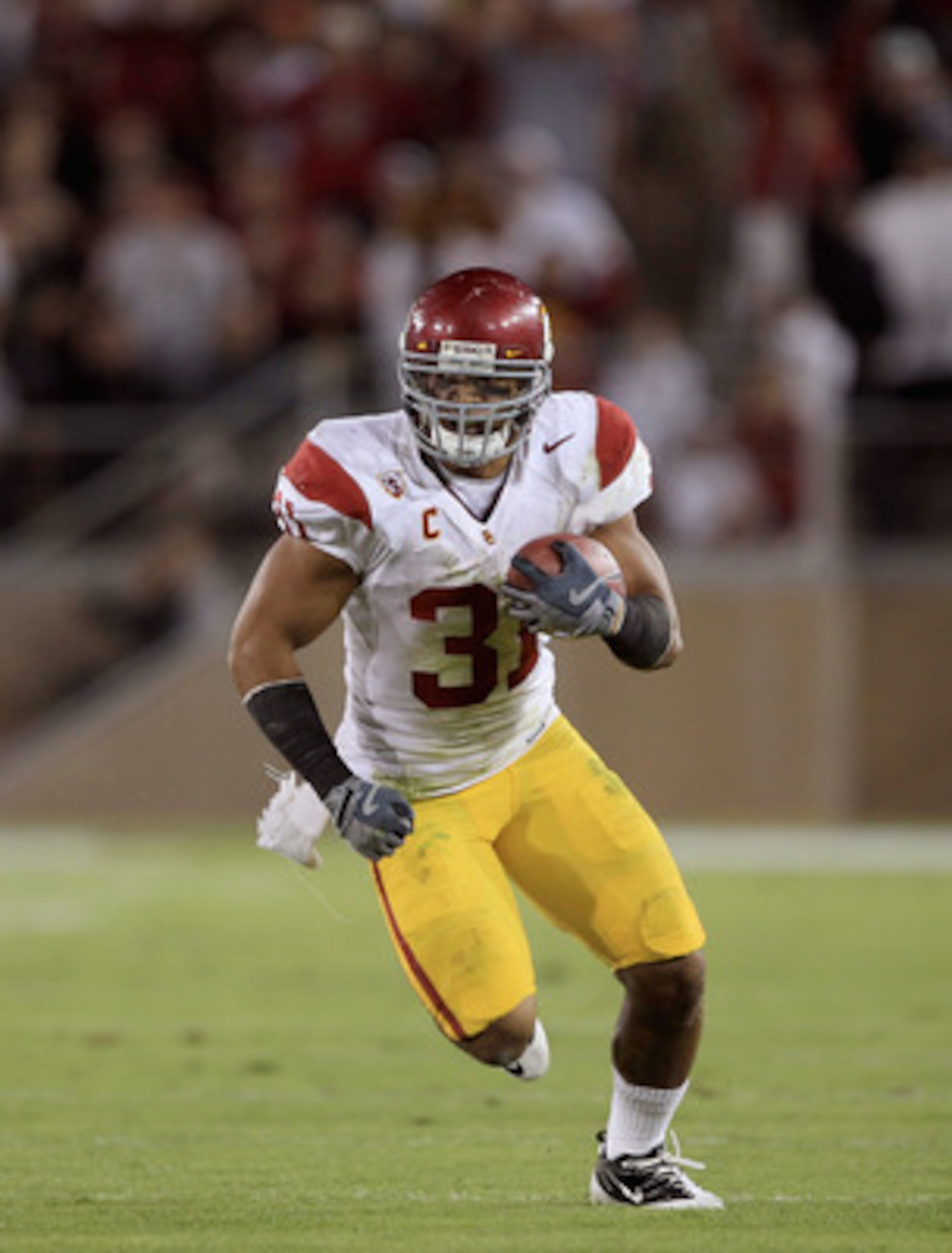 PALO ALTO, CA - OCTOBER 09: Stanley Havili #31 of the USC Trojans runs with the ball during their game against the Stanford Cardinal at Stanford Stadium on October 9, 2010 in Palo Alto, California. (Photo by Ezra Shaw/Getty Images) PALO ALTO, CA - OCTOBER 09: Stanley Havili #31 of the USC Trojans runs with the ball during their game against the Stanford Cardinal at Stanford Stadium on October 9, 2010 in Palo Alto, California. (Photo by Ezra Shaw/Getty Images)
