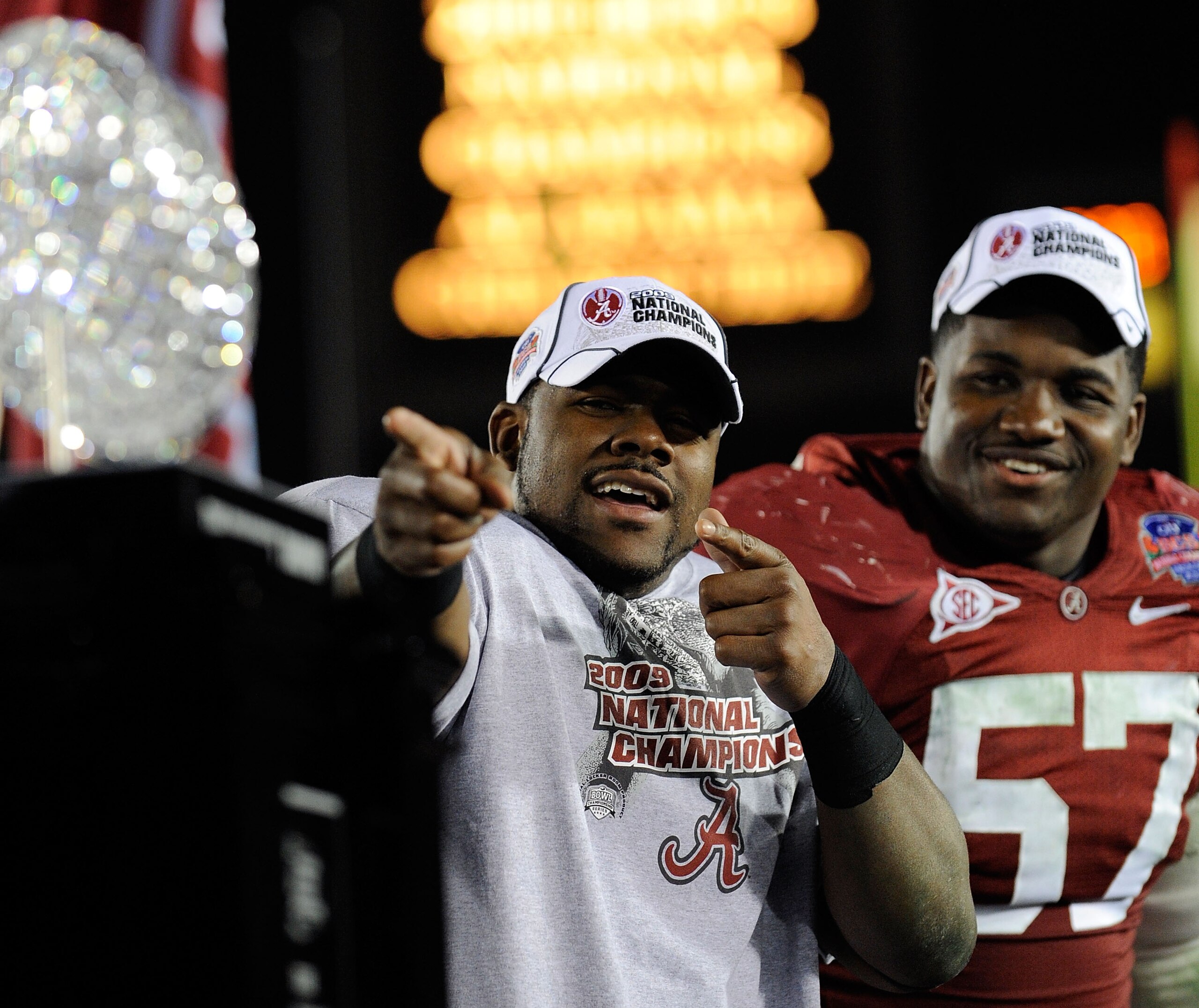 PASADENA, CA - JANUARY 07:  Running back Mark Ingram #22 and defensive lineman Marcell Dareus #57 of the Alabama Crimson Tide celebrate after winning the Citi BCS National Championship game over the Texas Longhorns at the Rose Bowl on January 7, 2010 in P