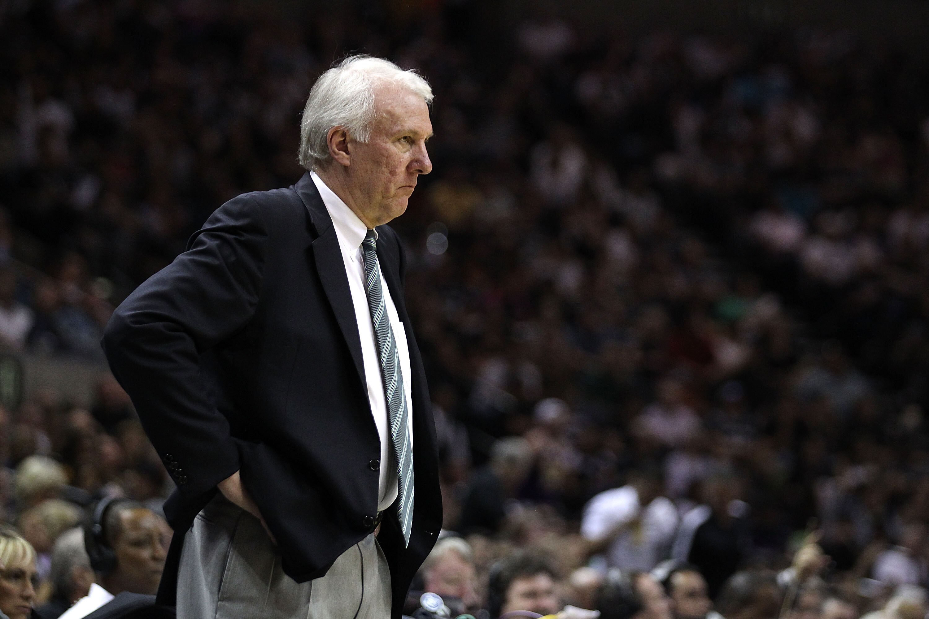 SAN ANTONIO, TX - APRIL 27:  Head coach Gregg Popovich of the San Antionio Spurs looks on against the Memphis Grizzlies in Game Five of the Western Conference Quarterfinals in the 2011 NBA Playoffs on April 27, 2011 at AT&T Center in San Antonio, Texas. N