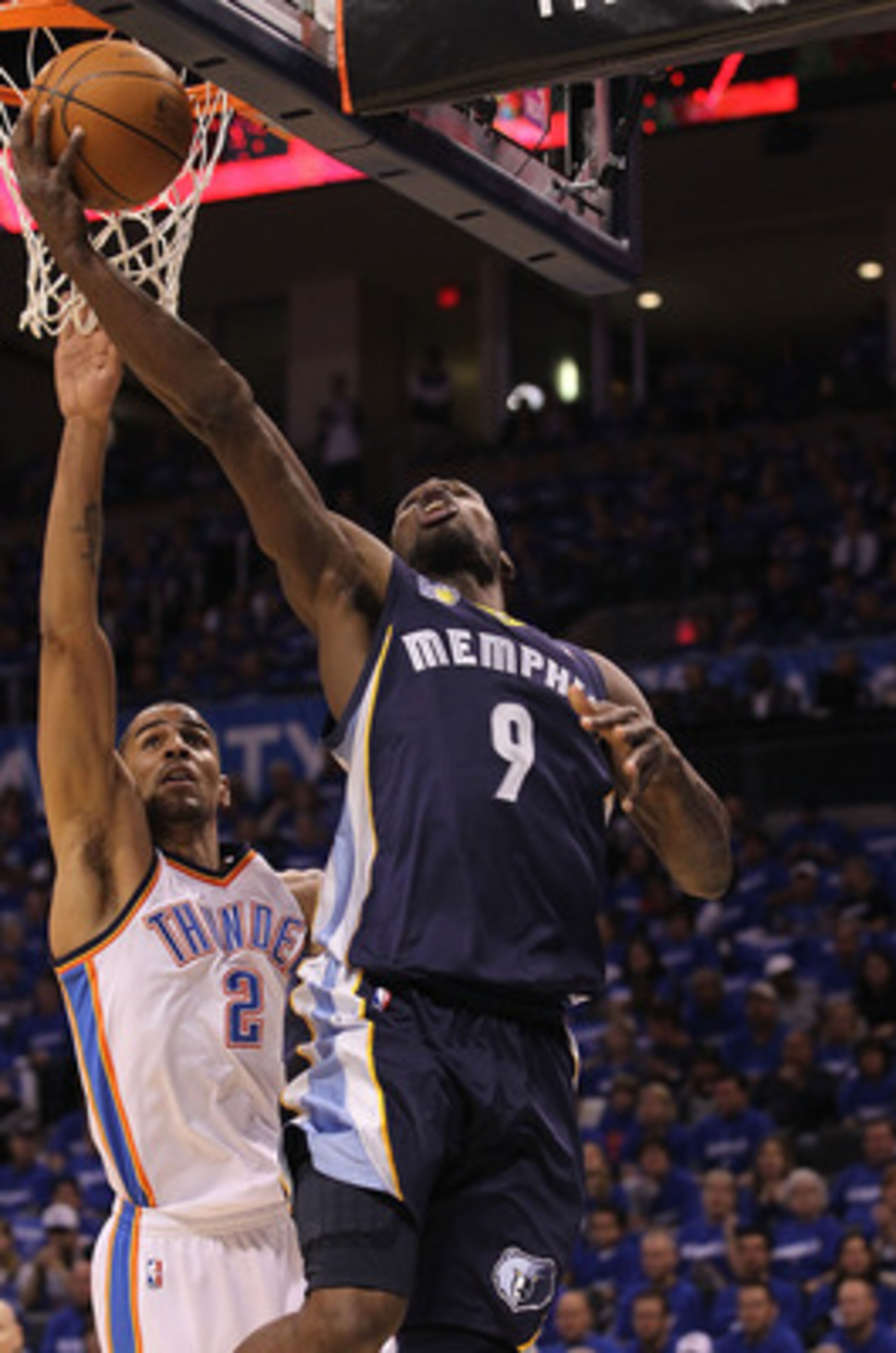 OKLAHOMA CITY, OK - MAY 01:  Guard Tony Allen #9 of the Memphis Grizzlies takes a shot against Thabo Sefolosha #2 of the Oklahoma City Thunder in Game One of the Western Conference Semifinals in the 2011 NBA Playoffs on May 1, 2011 at Oklahoma City Arena 