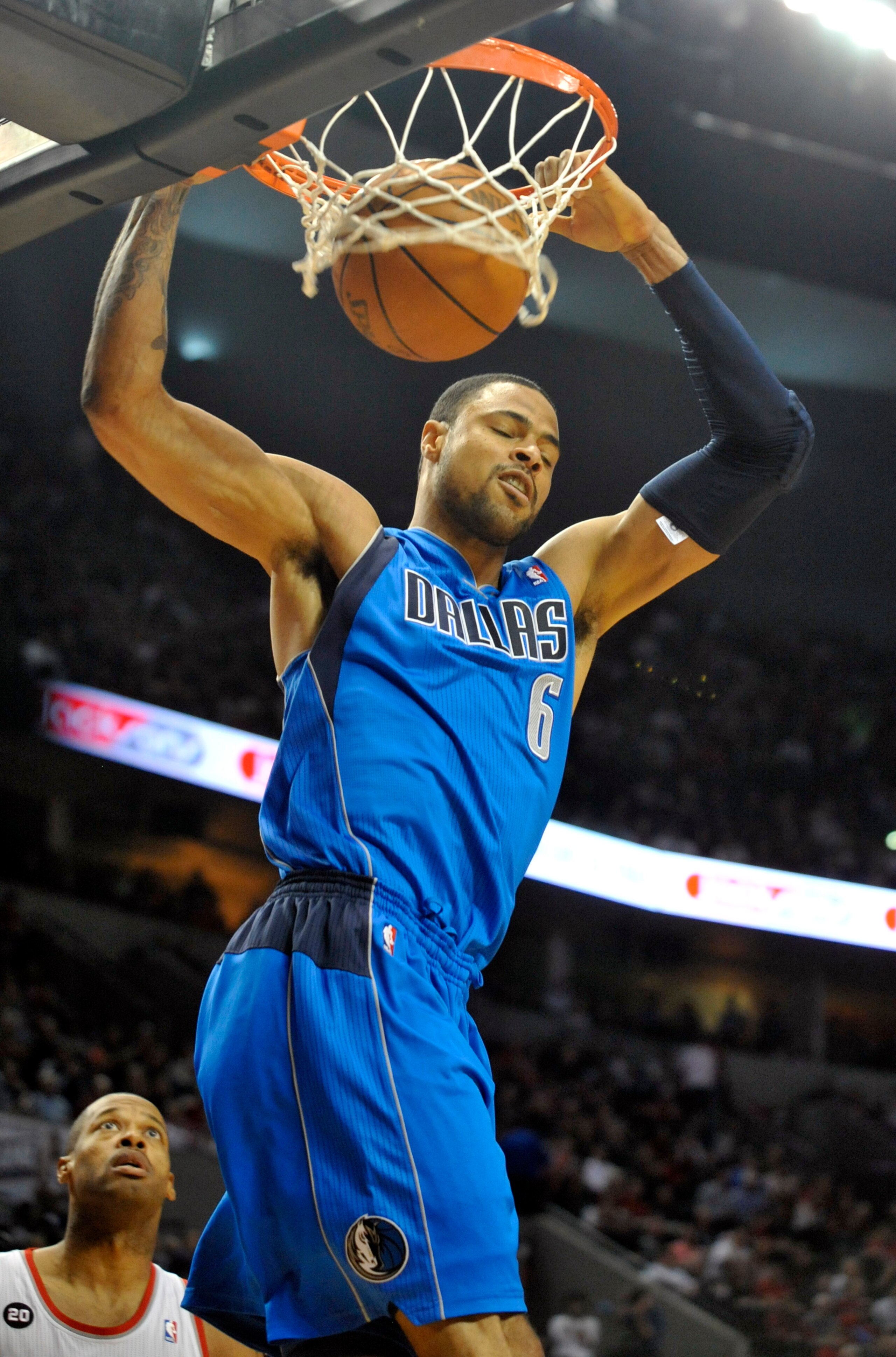PORTLAND, OR - APRIL 28: Tyson Chandler #6 of the Dallas Mavericks dunks over Marcus Camby #23 of the Portland Trail Blazers during the first quarter of Game Six of the Western Conference Quartefinals in the 2011 NBA Playsoffs on April 28, 2011 at the Ros