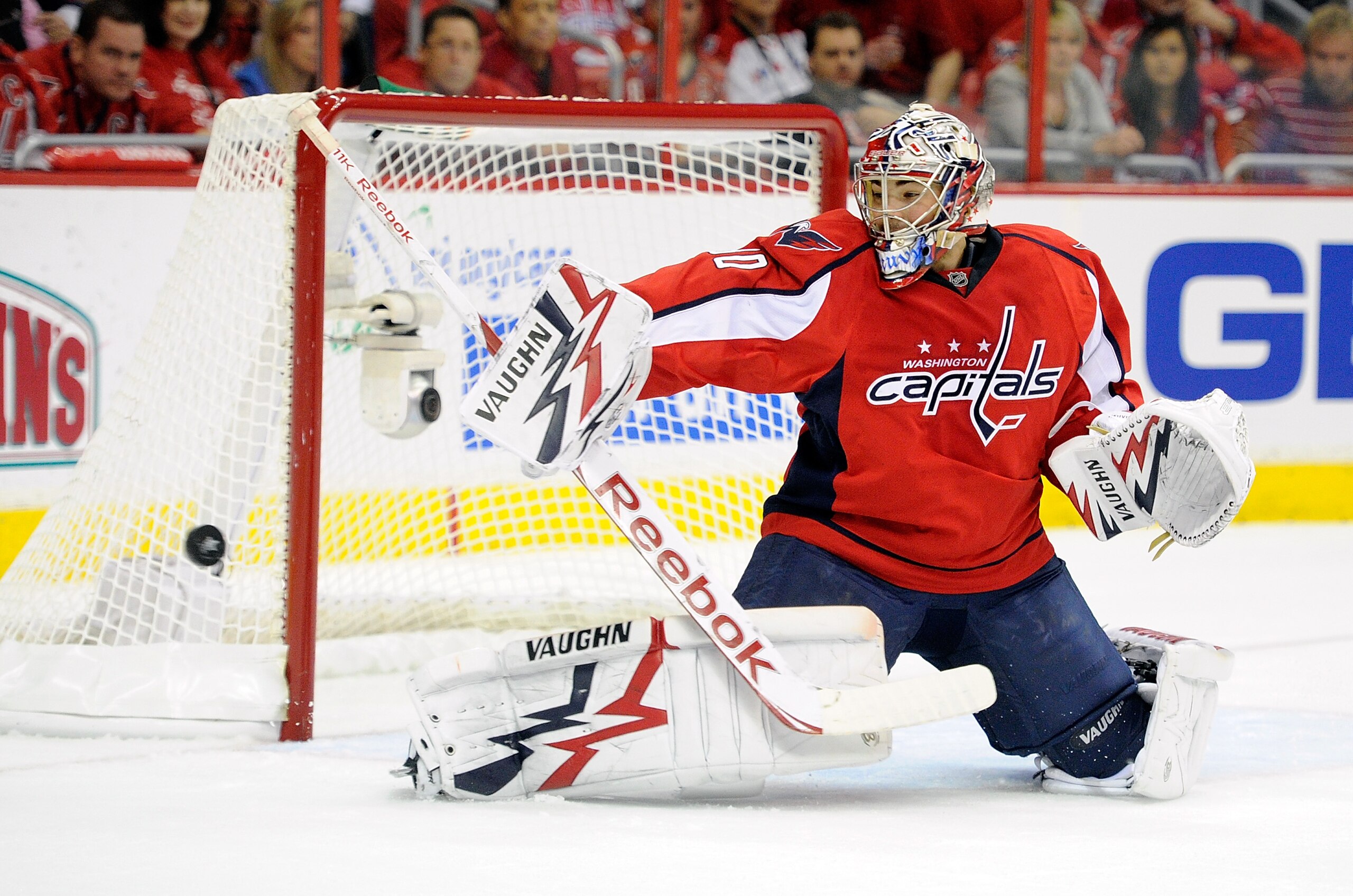 WASHINGTON, DC - APRIL 29:  Michal Neuvirth #30 of the Washington Capitals makes a save against the Tampa Bay Lightning during Game One of the Eastern Conference Semifinal during the 2011 NHL Stanley Cup Finals at the Verizon Center on April 29, 2011 in W