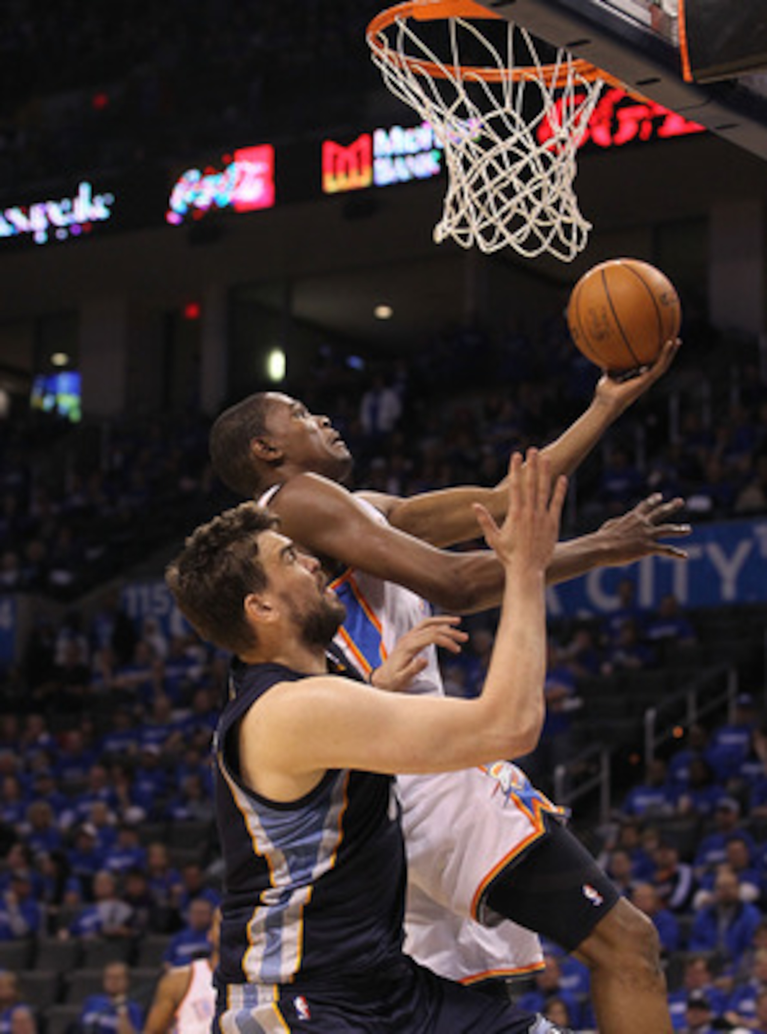OKLAHOMA CITY, OK - MAY 01:  Forward Kevin Durant #35 of the Oklahoma City Thunder takes a shot against Marc Gasol #33 of the Memphis Grizzlies in Game One of the Western Conference Semifinals in the 2011 NBA Playoffs on May 1, 2011 at Oklahoma City Arena
