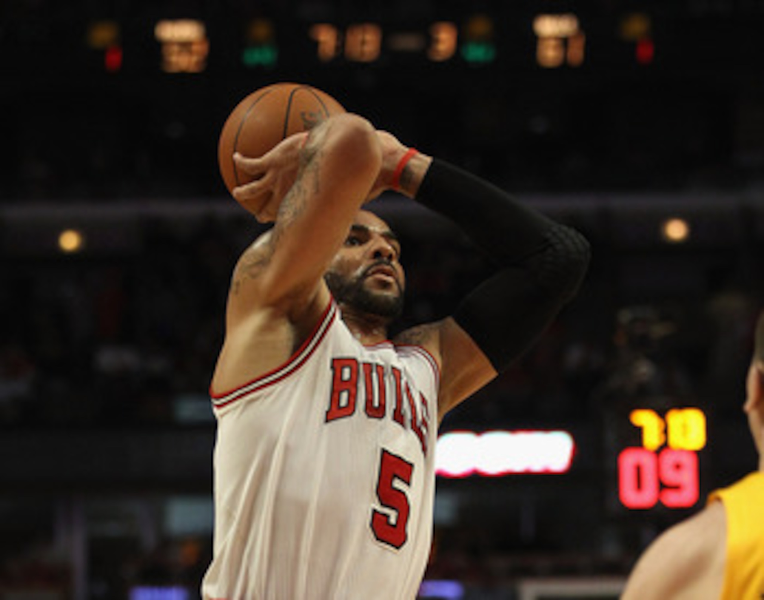 CHICAGO, IL - APRIL 26: Carlos Boozer #5 of the Chicago Bulls takes a shot against the Indiana Pacers in Game Five of the Eastern Conference Quarterfinals in the 2011 NBA Playoffs at the United Center on April 26, 2011 in Chicago, Illinois. The Bulls defe