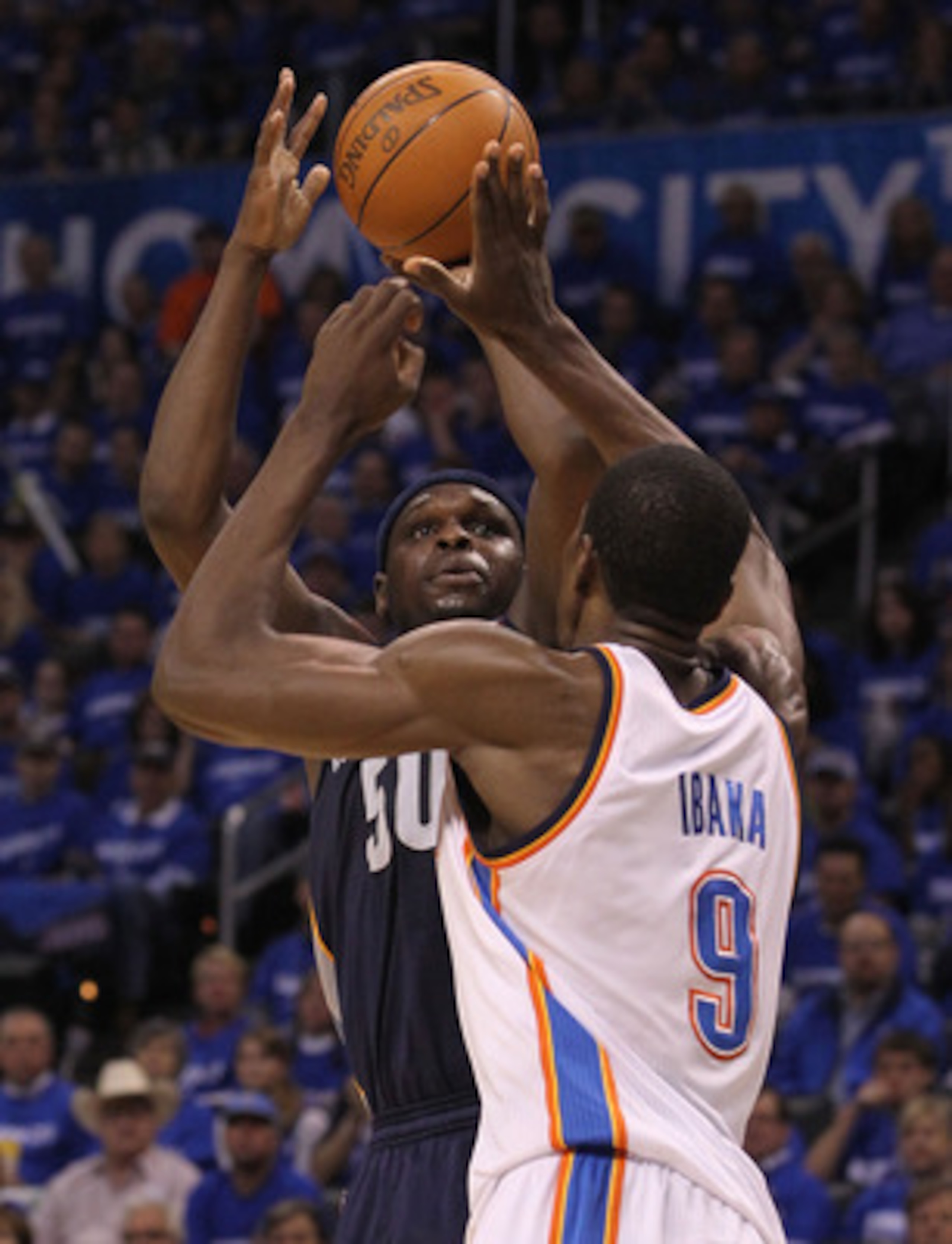 OKLAHOMA CITY, OK - MAY 01:  (L-R) Zach Randolph #50 of the Memphis Grizzlies takes a shot against Serge Ibaka #9 of the Oklahoma City Thunder in Game One of the Western Conference Semifinals in the 2011 NBA Playoffs on May 1, 2011 at Oklahoma City Arena 