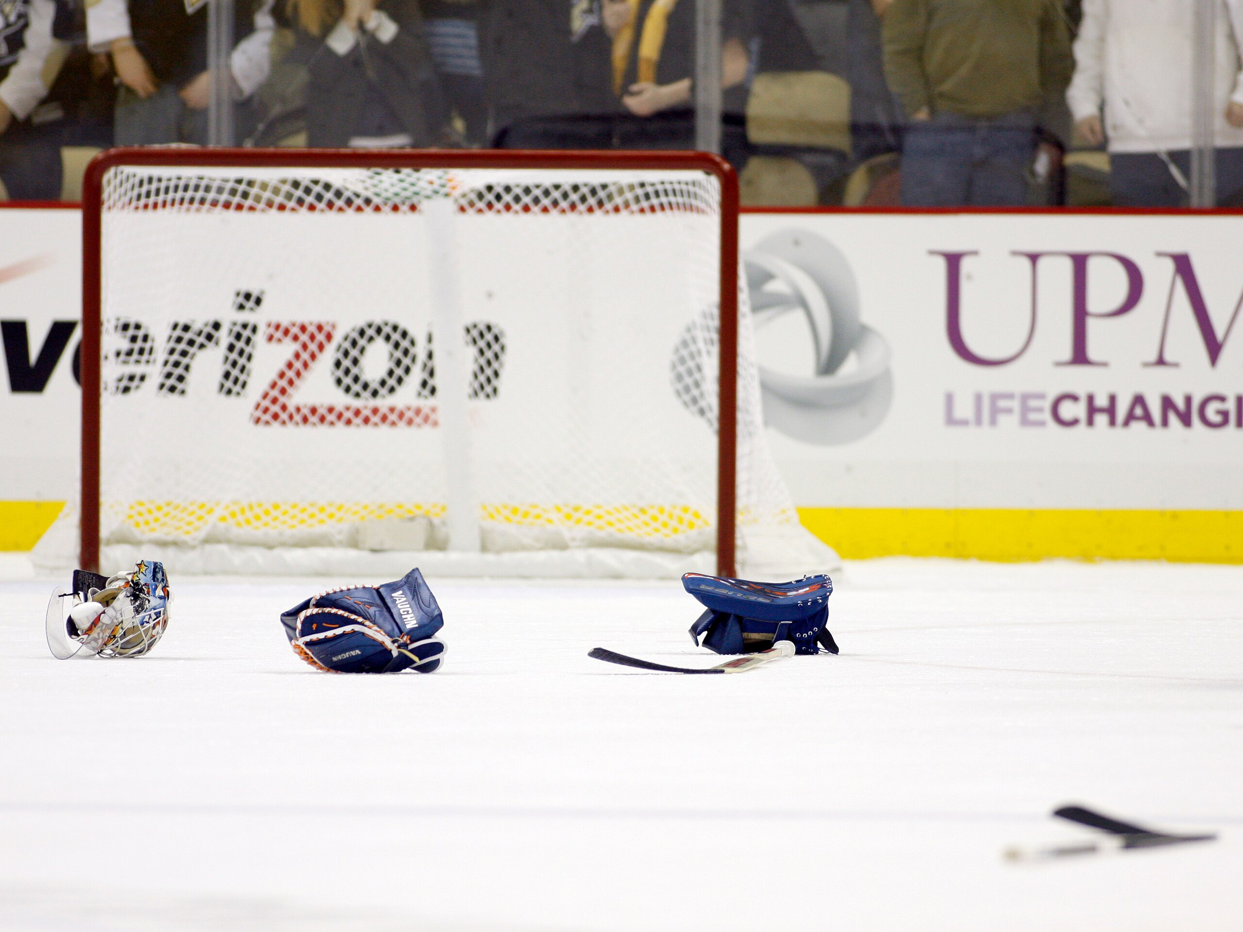 PITTSBURGH, PA - FEBRUARY 02:  The equipment of Rick DiPietro #39 of the New York Islanders (not pictured) lies on the ice after mixing it up with Brent Johnson #1 of the Pittsburgh Penguins (not pictured) at Consol Energy Center on February 2, 2011 in Pi