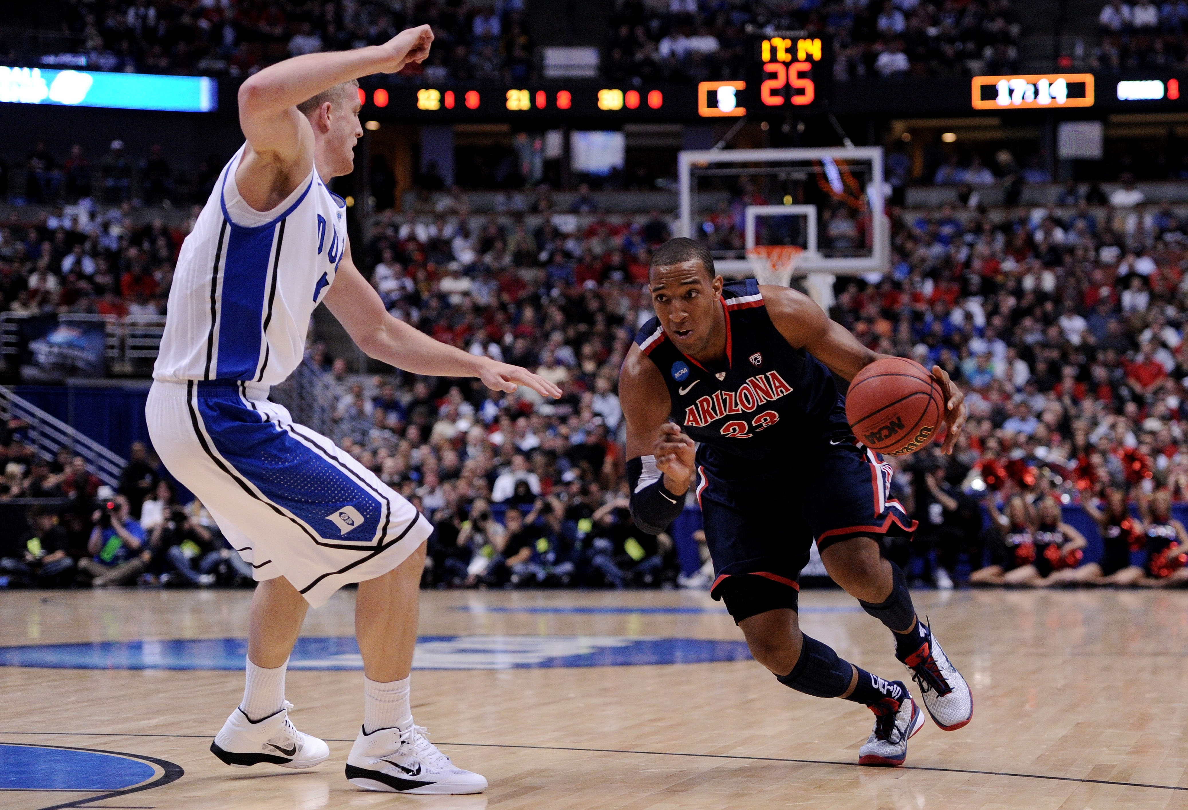 ANAHEIM, CA - MARCH 24:  Derrick Williams #23 of the Arizona Wildcats handles the ball against Mason Plumlee #5 of the Duke Blue Devils during the west regional semifinal of the 2011 NCAA men's basketball tournament at the Honda Center on March 24, 2011 i