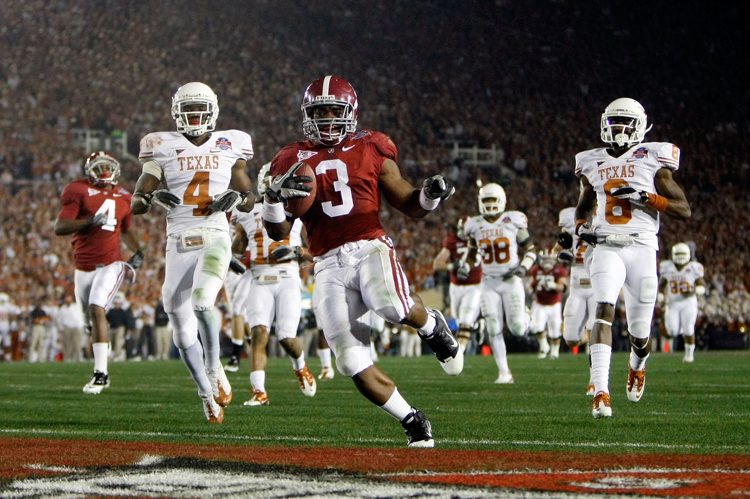 PASADENA, CA - JANUARY 07:  Running back Trent Richardson #3 of the Alabama Crimson Tide runs for a touchdown against the Texas Longhorns in the second quarter of the Citi BCS National Championship game at the Rose Bowl on January 7, 2010 in Pasadena, Cal