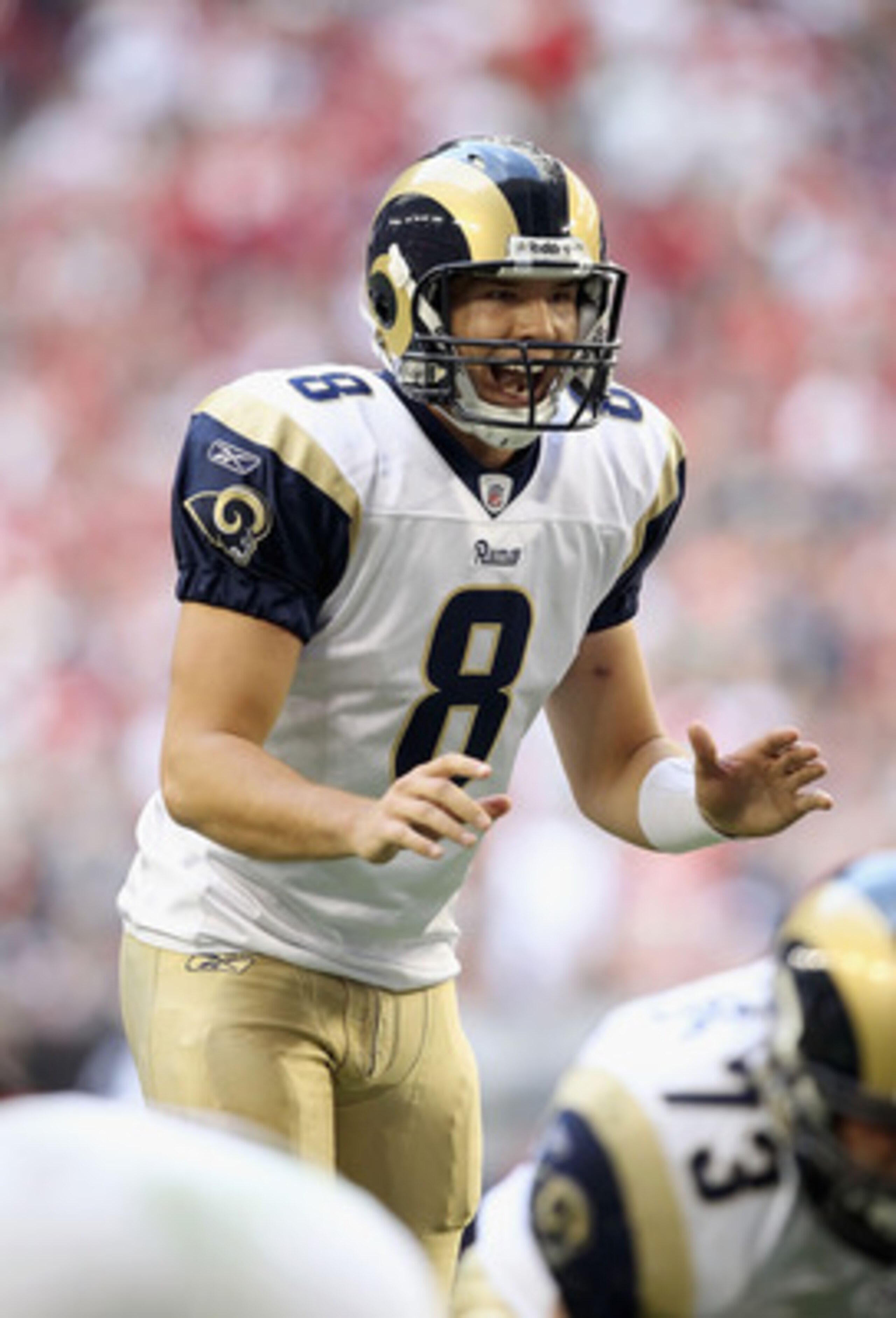 GLENDALE, AZ - DECEMBER 05: Quarterback Sam Bradford #8 of the St. Louis Rams prepares to snap the ball during the NFL game against the Arizona Cardinals at the University of Phoenix Stadium on December 5, 2010 in Glendale, Arizona. The Rams defeated th GLENDALE, AZ - DECEMBER 05: Quarterback Sam Bradford #8 of the St. Louis Rams prepares to snap the ball during the NFL game against the Arizona Cardinals at the University of Phoenix Stadium on December 5, 2010 in Glendale, Arizona. The Rams defeated th