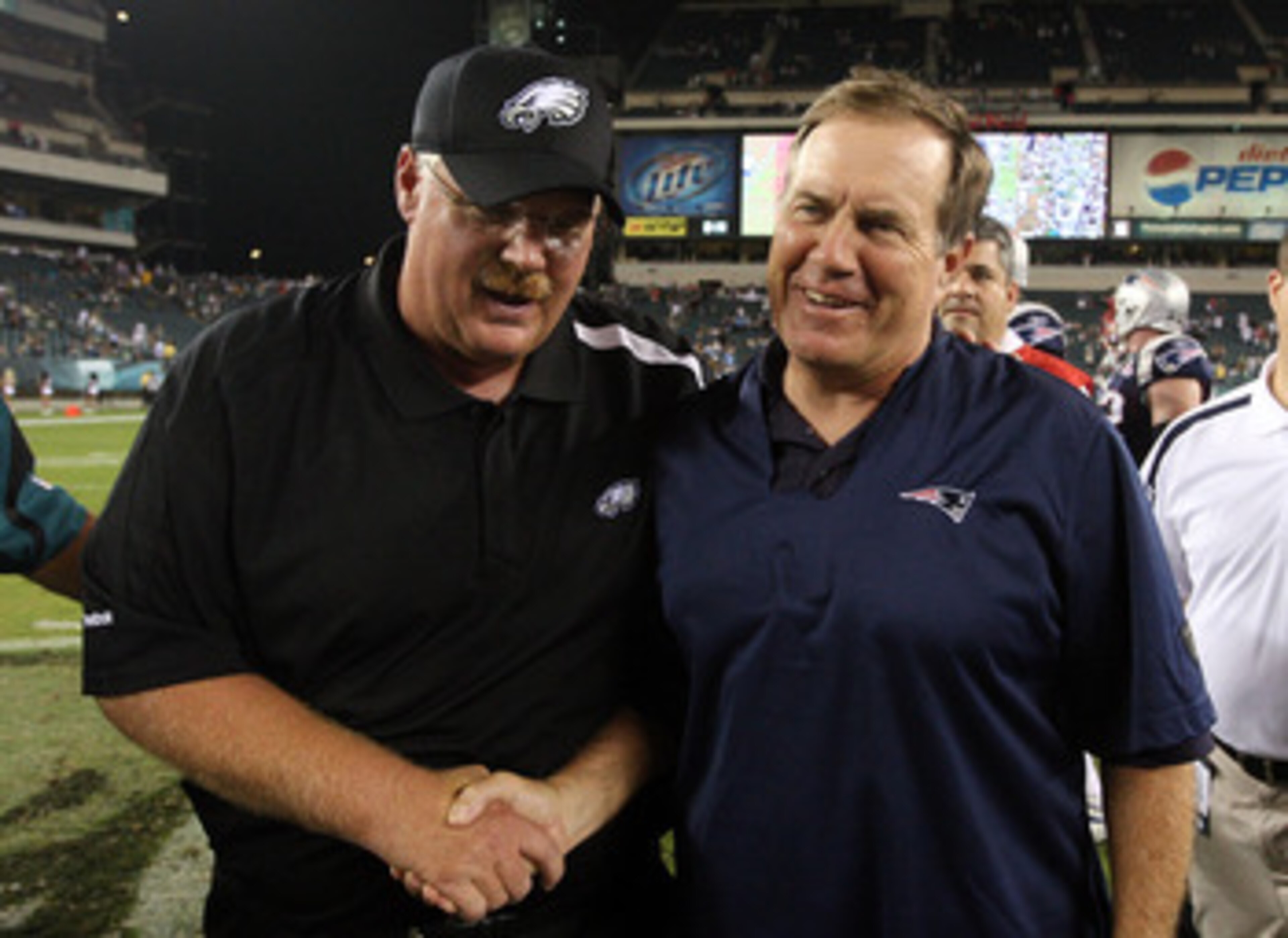 PHILADELPHIA - AUGUST 13:  Head coach Andy Reid of the Philadelphia Eagles shakes hands with head coach Bill Belichick of the New England Patriots after their game on August 13, 2009 at Lincoln Financial Field in Philadelphia, Pennsylvania.  (Photo by Jim