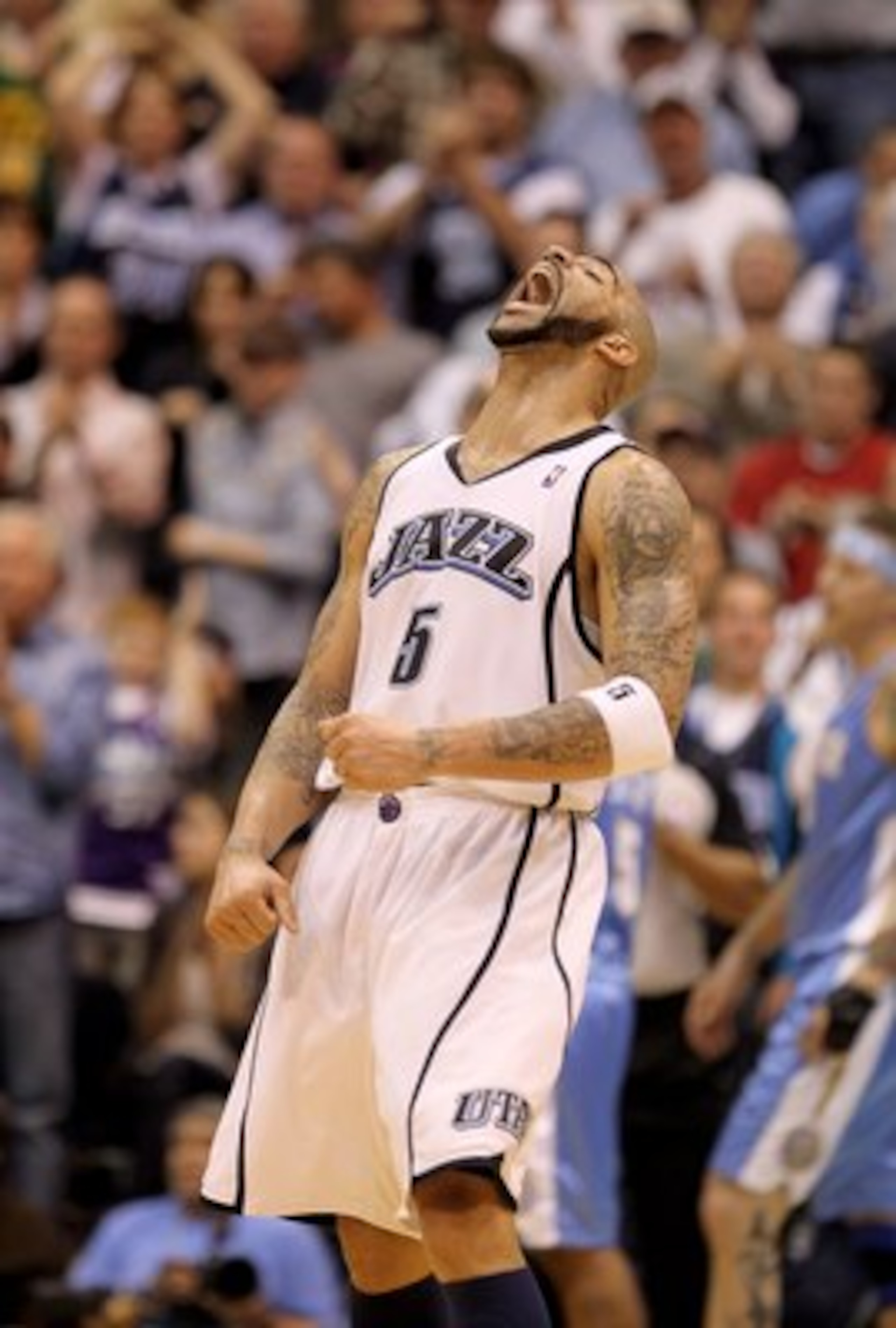 SALT LAKE CITY - APRIL 30:  Carlos Boozer #5 of the Utah Jazz celebrates after a Jazz went ahead 76-75 in the third period of their game against the Denver Nuggets during Game Six of the Western Conference Quarterfinals of the 2010 NBA Playoffs at EnergyS