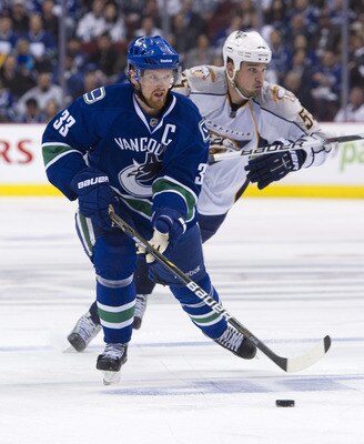 VANCOUVER, CANADA - APRIL 28: Henrik Sedin #33 of the Vancouver Canucks skates with the puck during Game One of the Western Conference Semifinals against the Nashville Predators during the 2011 NHL Stanley Cup Playoffs on April 28, 2011 at Rogers Arena in