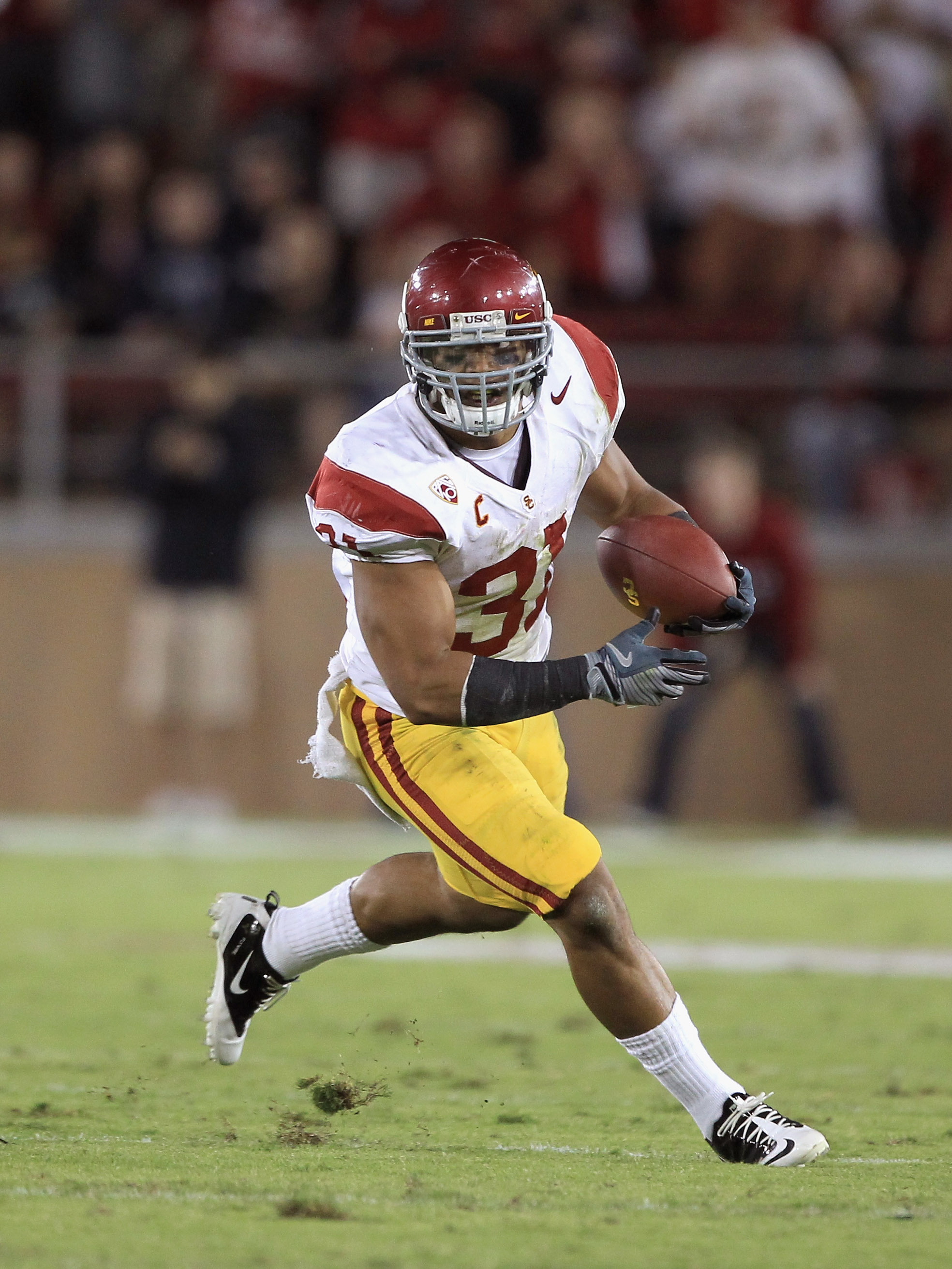 PALO ALTO, CA - OCTOBER 09: Stanley Havili #31 of the USC Trojans runs with the ball during their game against the Stanford Cardinal at Stanford Stadium on October 9, 2010 in Palo Alto, California. (Photo by Ezra Shaw/Getty Images) PALO ALTO, CA - OCTOBER 09: Stanley Havili #31 of the USC Trojans runs with the ball during their game against the Stanford Cardinal at Stanford Stadium on October 9, 2010 in Palo Alto, California. (Photo by Ezra Shaw/Getty Images)