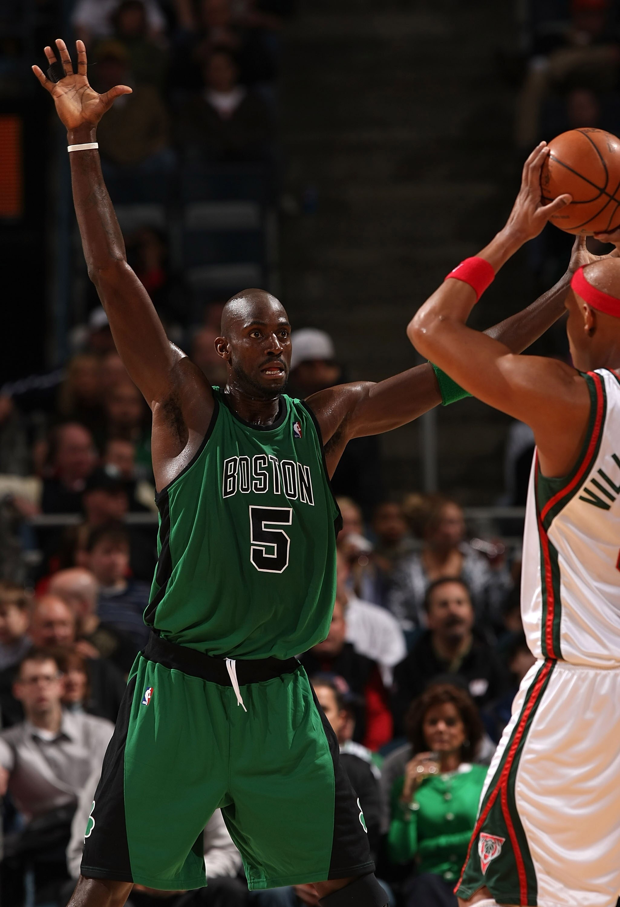 MILWAUKEE - APRIL 08: Kevin Garnett #5 of the Boston Celtics waves his hands in front of Charlie Villanueva #31 of the Milwaukee Bucks on April 8, 2008 at the Bradley Center in Milwaukee, Wisconsin.The Celtics defeated the Bucks 107-104 in overtime. NOTE