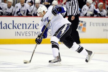 WASHINGTON, DC - APRIL 29:  Steven Stamkos #91 of the Tampa Bay Lightning  shoots the puck against the Washington Capitals during Game One of the Eastern Conference Semifinal during the 2011 NHL Stanley Cup Finals at the Verizon Center on April 29, 2011 i