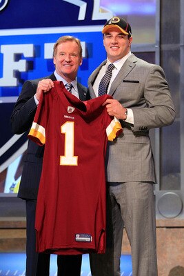 NEW YORK, NY - APRIL 28:  NFL Commissioner Roger Goodell (L) poses for a photo with Ryan Kerrigan, #16 overall pick by the Washington Redskins, on stage during the 2011 NFL Draft at Radio City Music Hall on April 28, 2011 in New York City.  (Photo by Chri