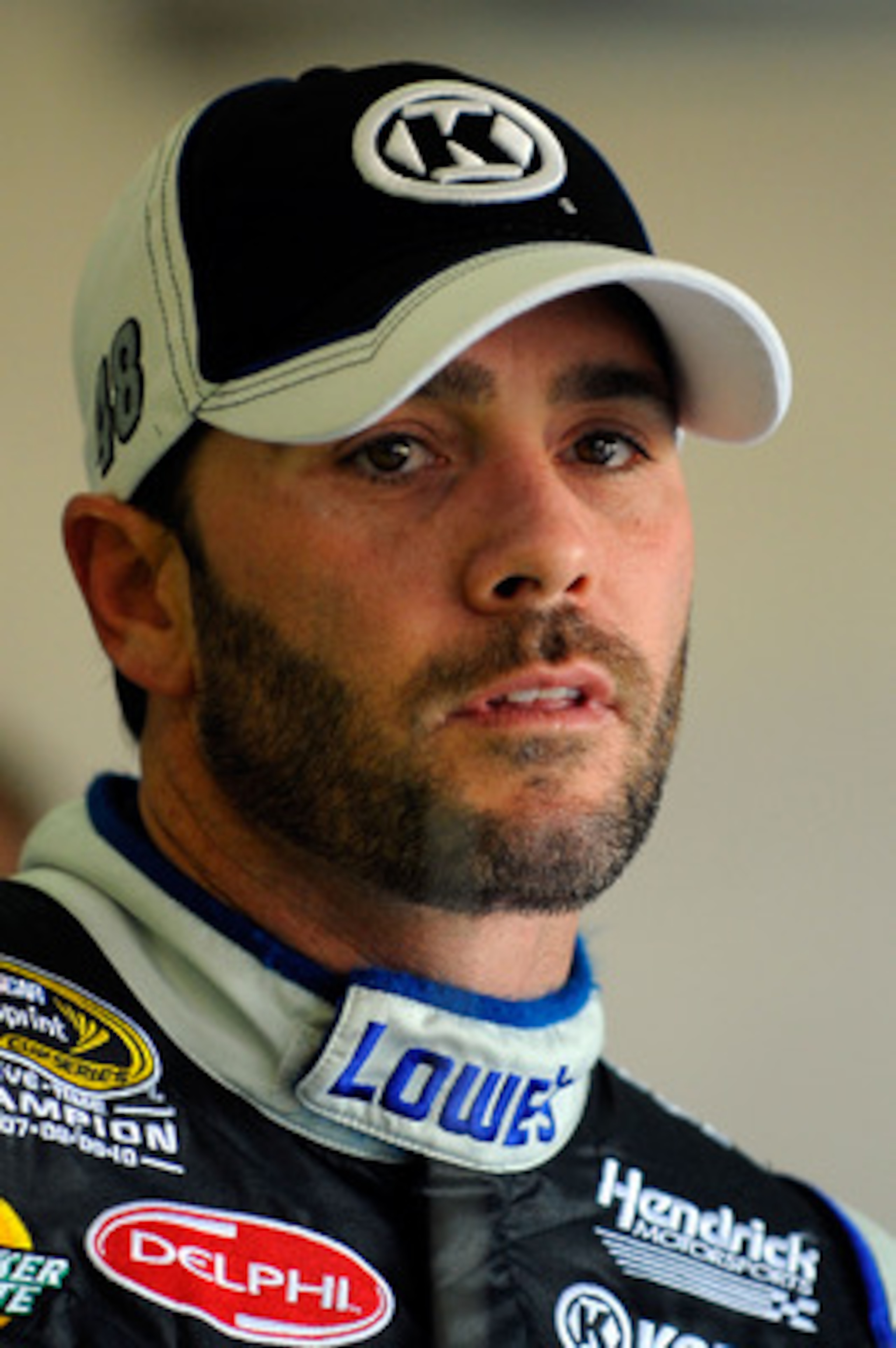 FORT WORTH, TX - APRIL 07:  Jimmie Johnson, driver of the #48 Lowe's/Kobalt Tools Chevrolet, stands in the garage area during practice for the NASCAR Sprint Cup Series Samsung Mobile 500 at Texas Motor Speedway on April 7, 2011 in Fort Worth, Texas.  (Pho